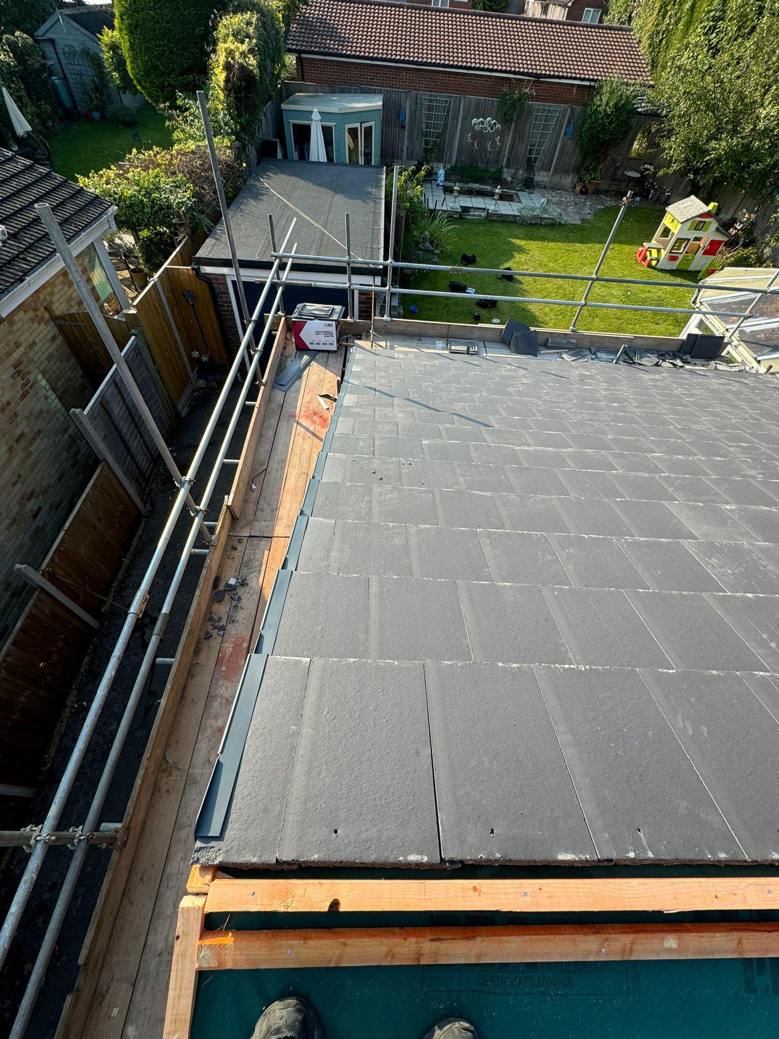 Professional roofers working on a property in London - KS Roof Master
