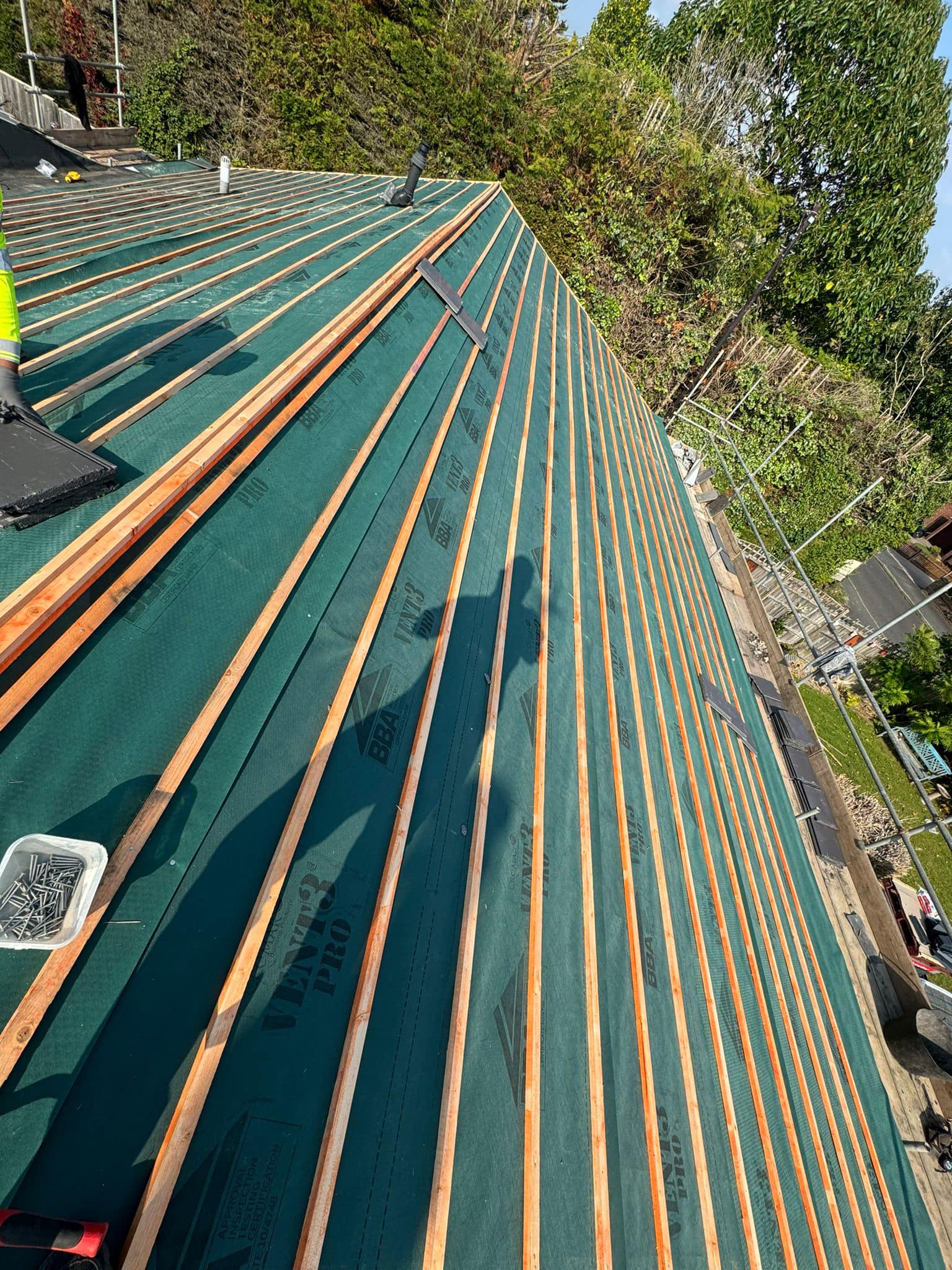 Professional roofers working on a property in London - KS Roof Master