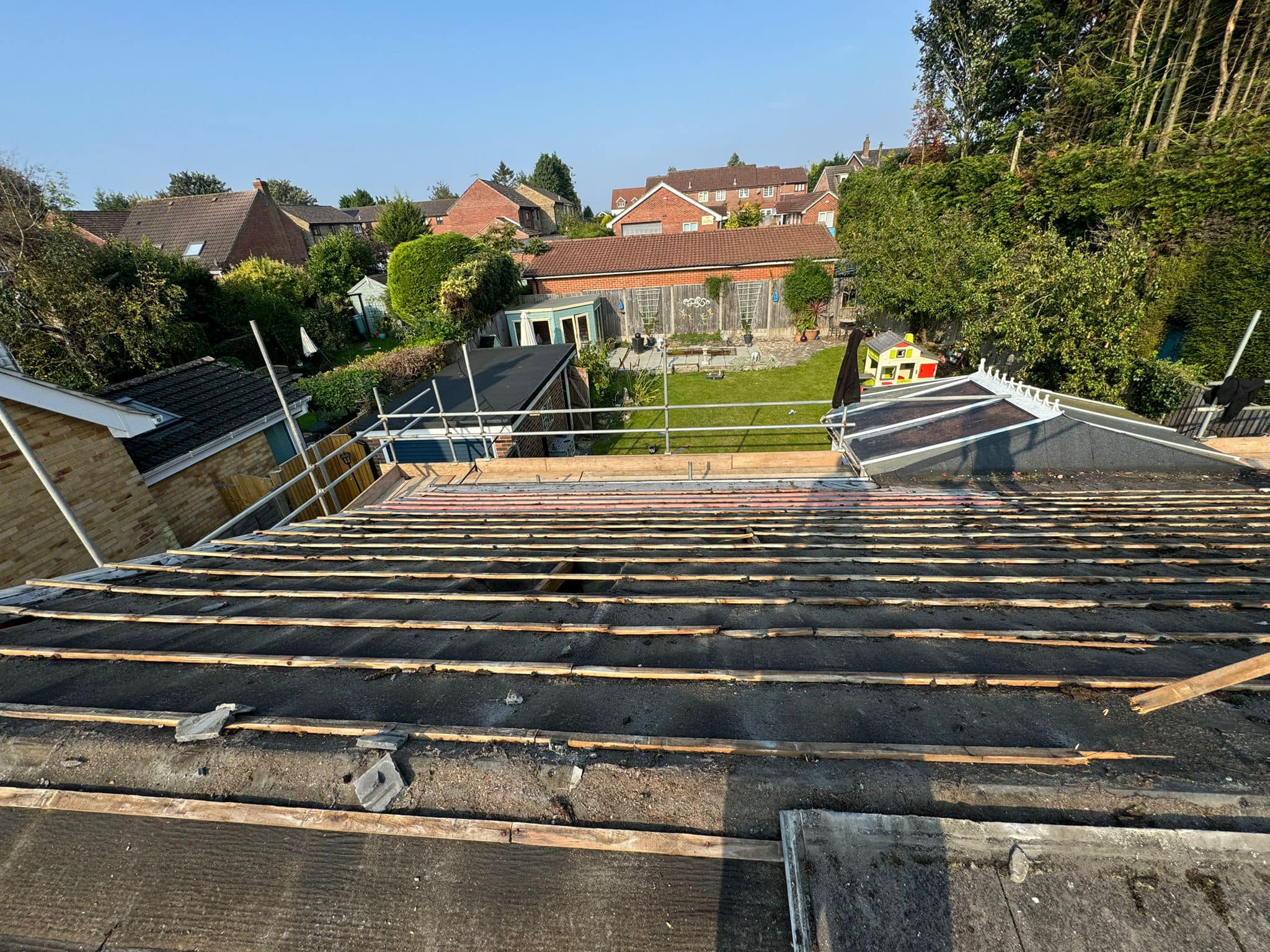 Professional roofers working on a property in London - KS Roof Master