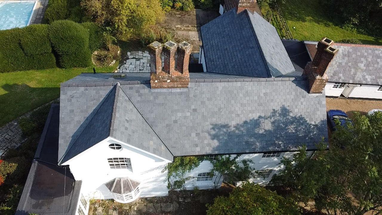 Professional roofers working on a property in London - KS Roof Master