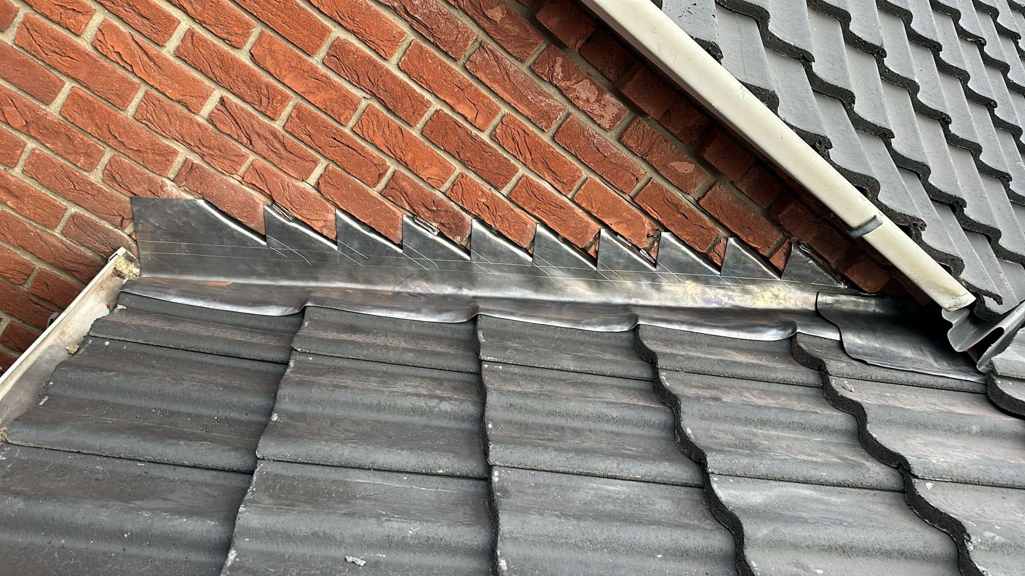 Professional roofers working on a property in London - KS Roof Master