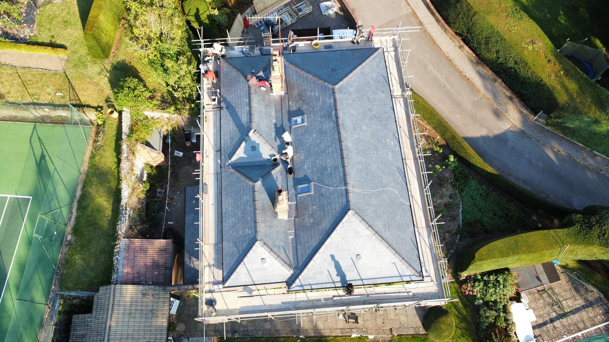 Professional roofers working on a property in London - KS Roof Master