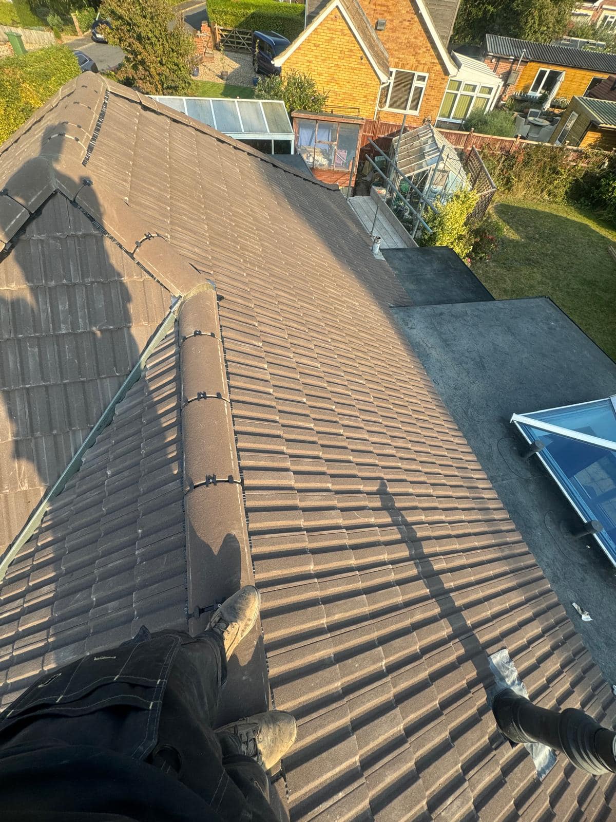 Professional roofers working on a property in London - KS Roof Master