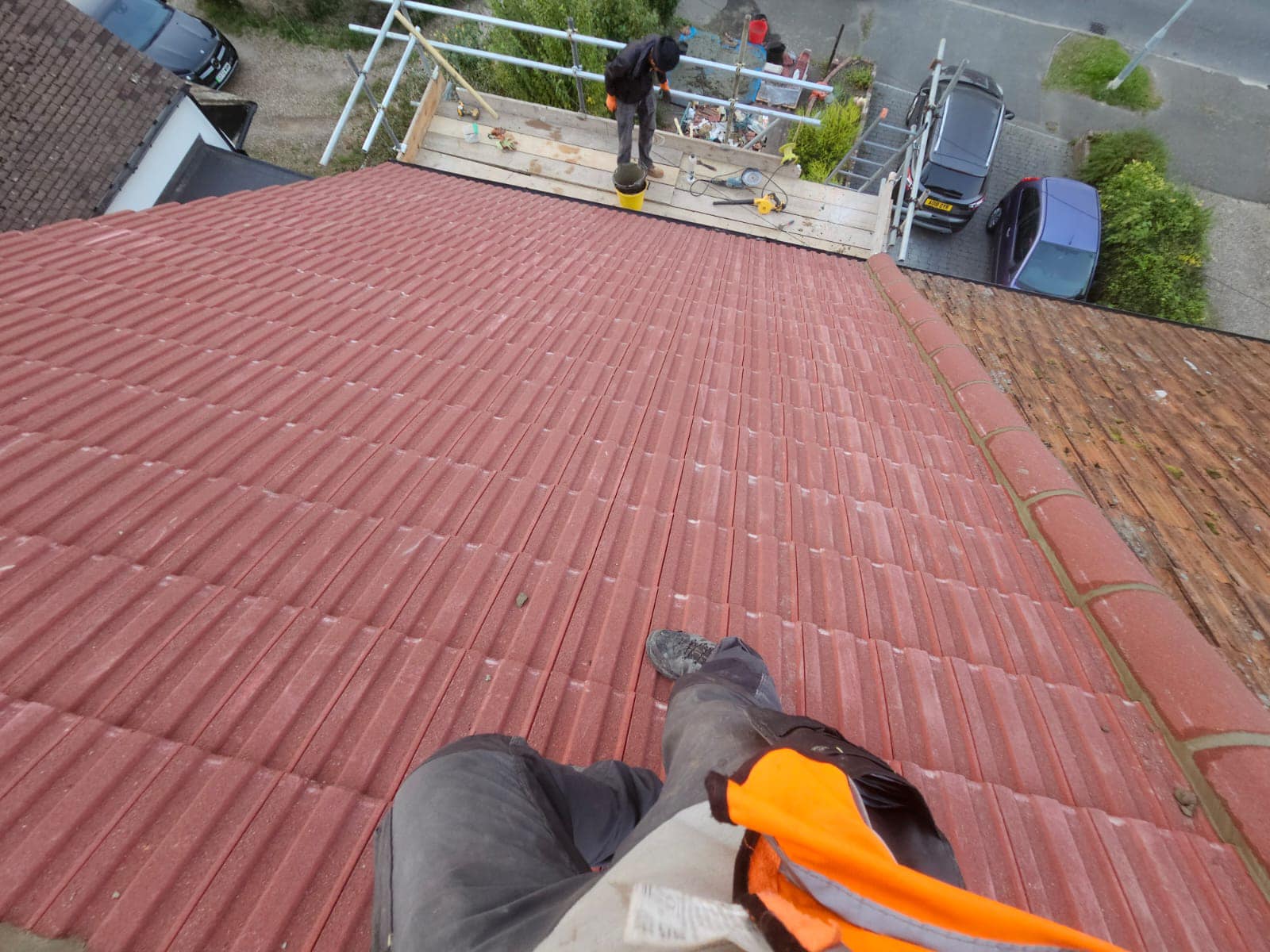 Professional roofers working on a property in London - KS Roof Master