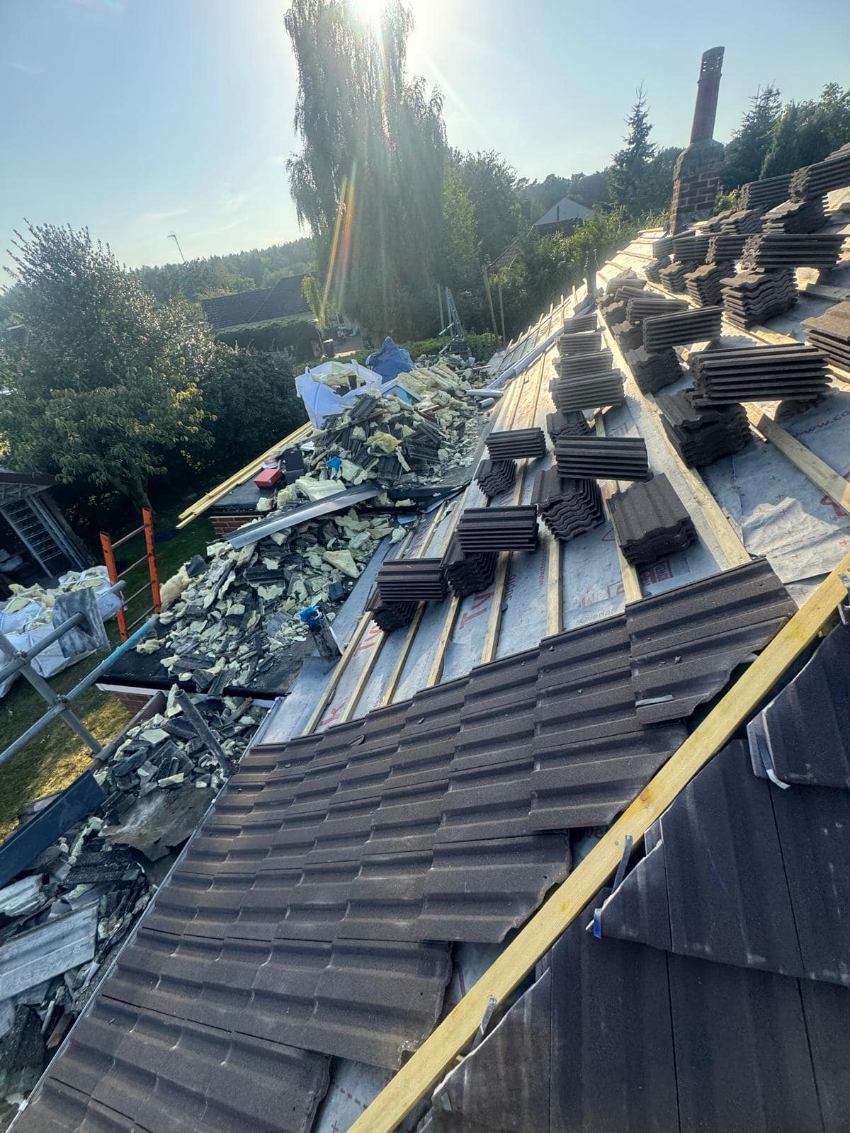 Professional roofers working on a property in London - KS Roof Master