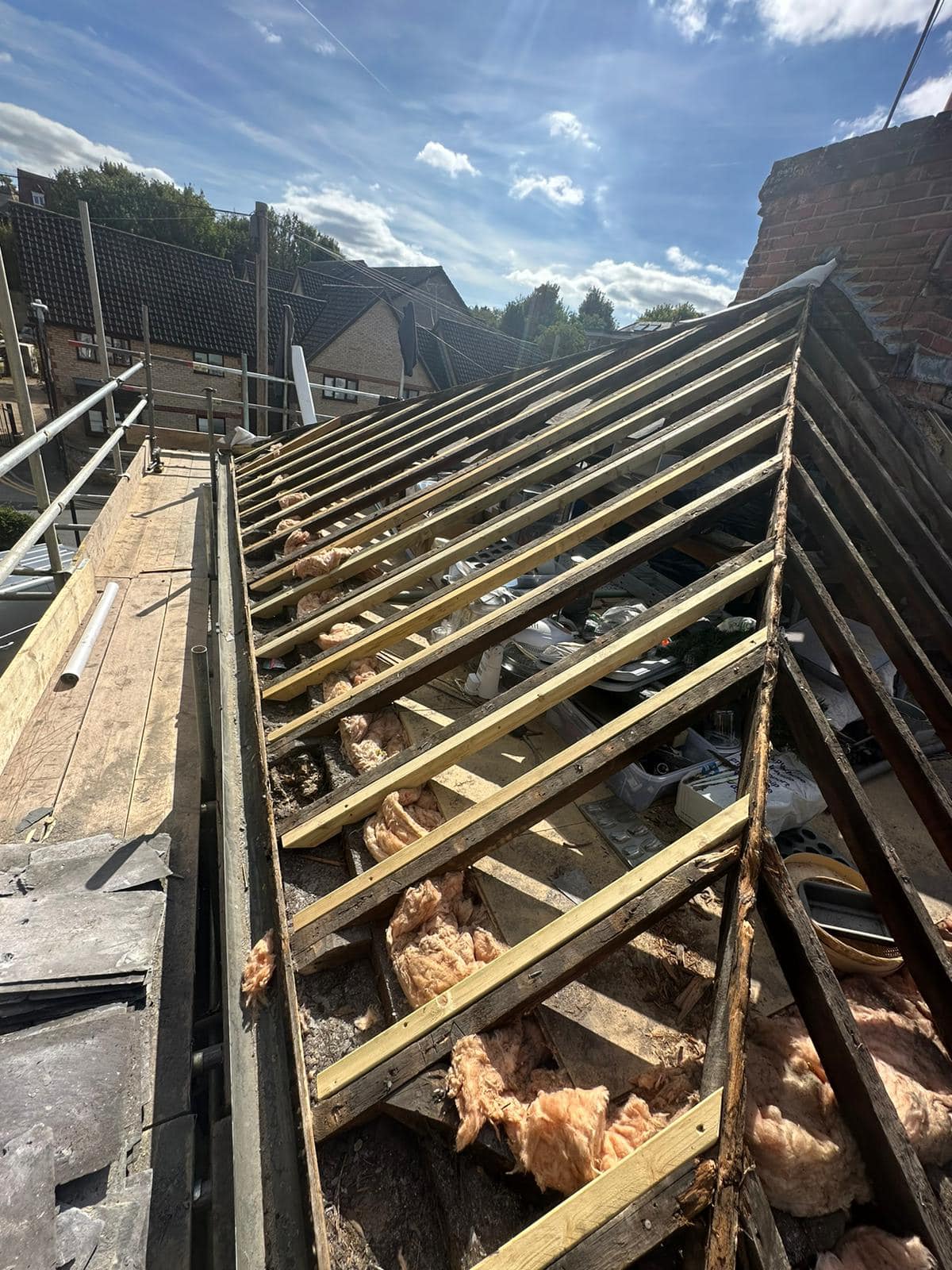 Professional roofers working on a property in London - KS Roof Master