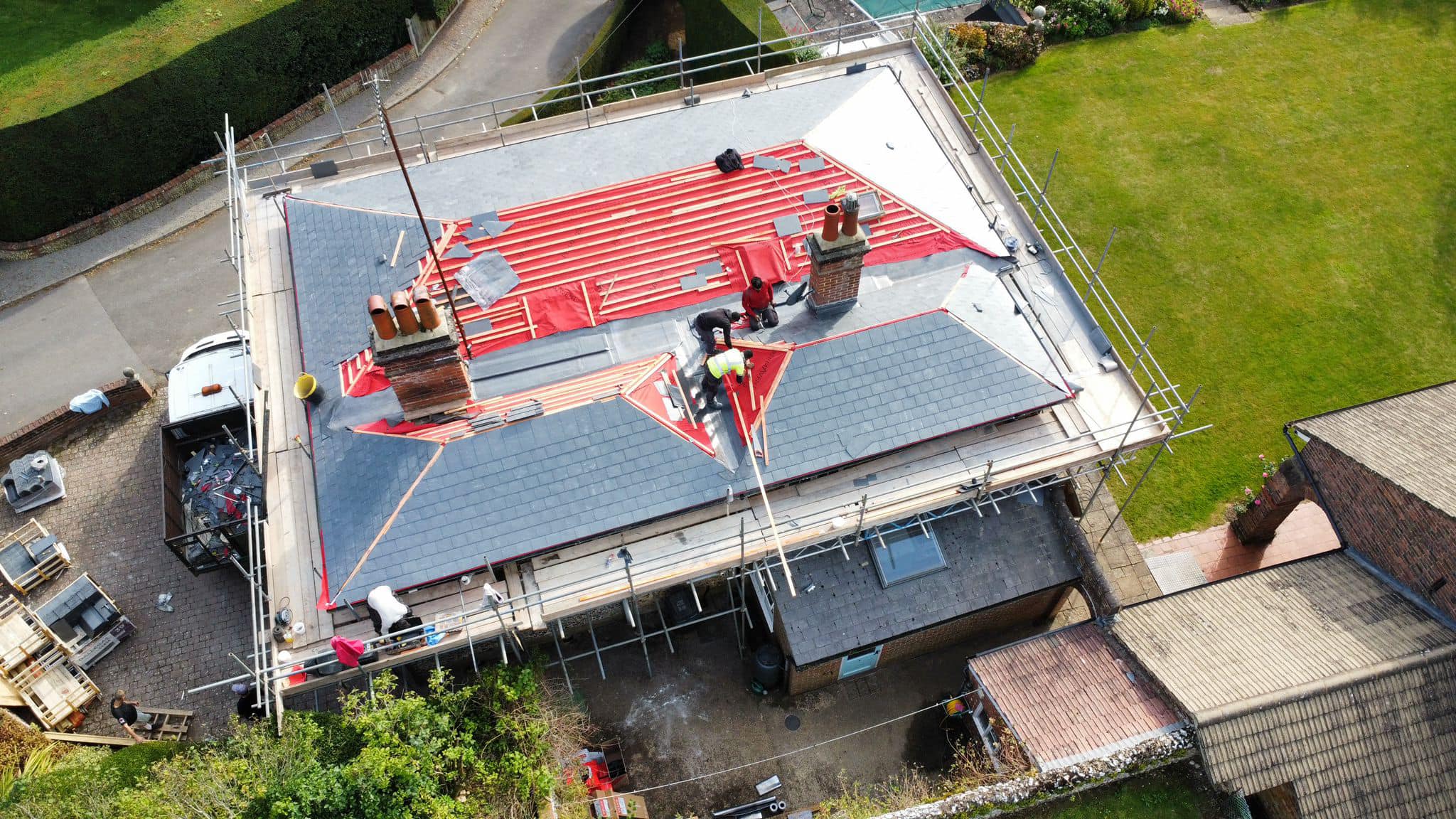 Professional roofers working on a property in London - KS Roof Master