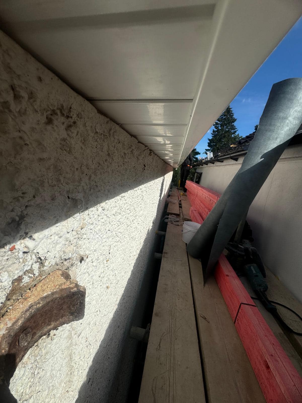 Professional roofers working on a property in London - KS Roof Master