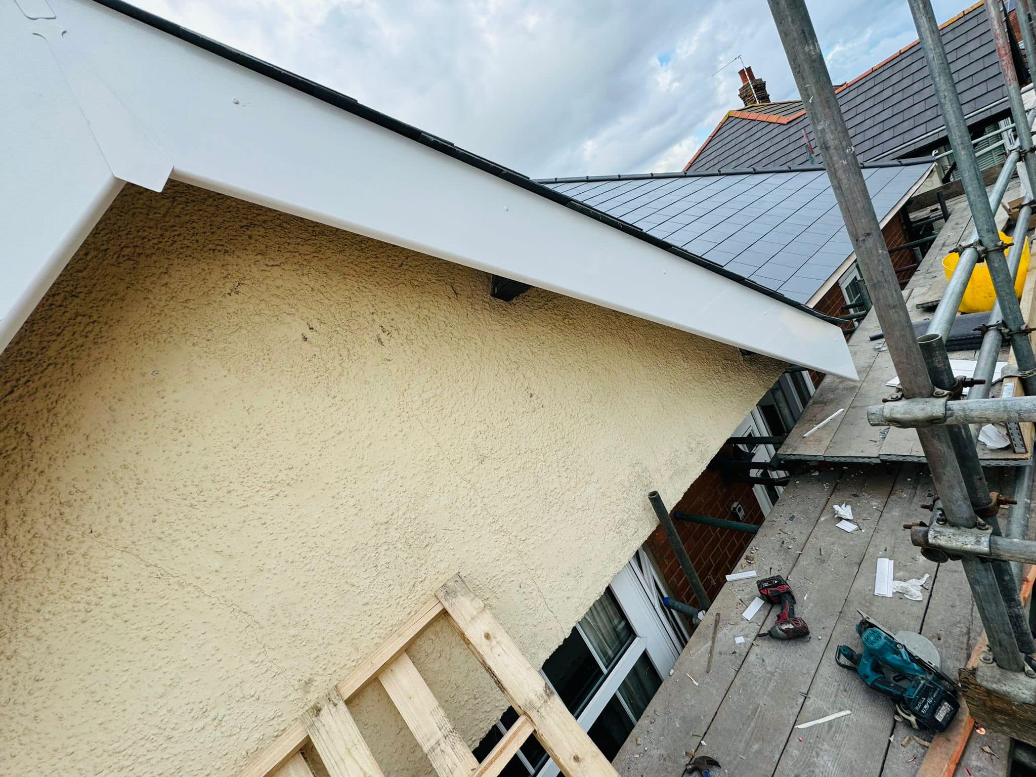 Professional roofers working on a property in London - KS Roof Master