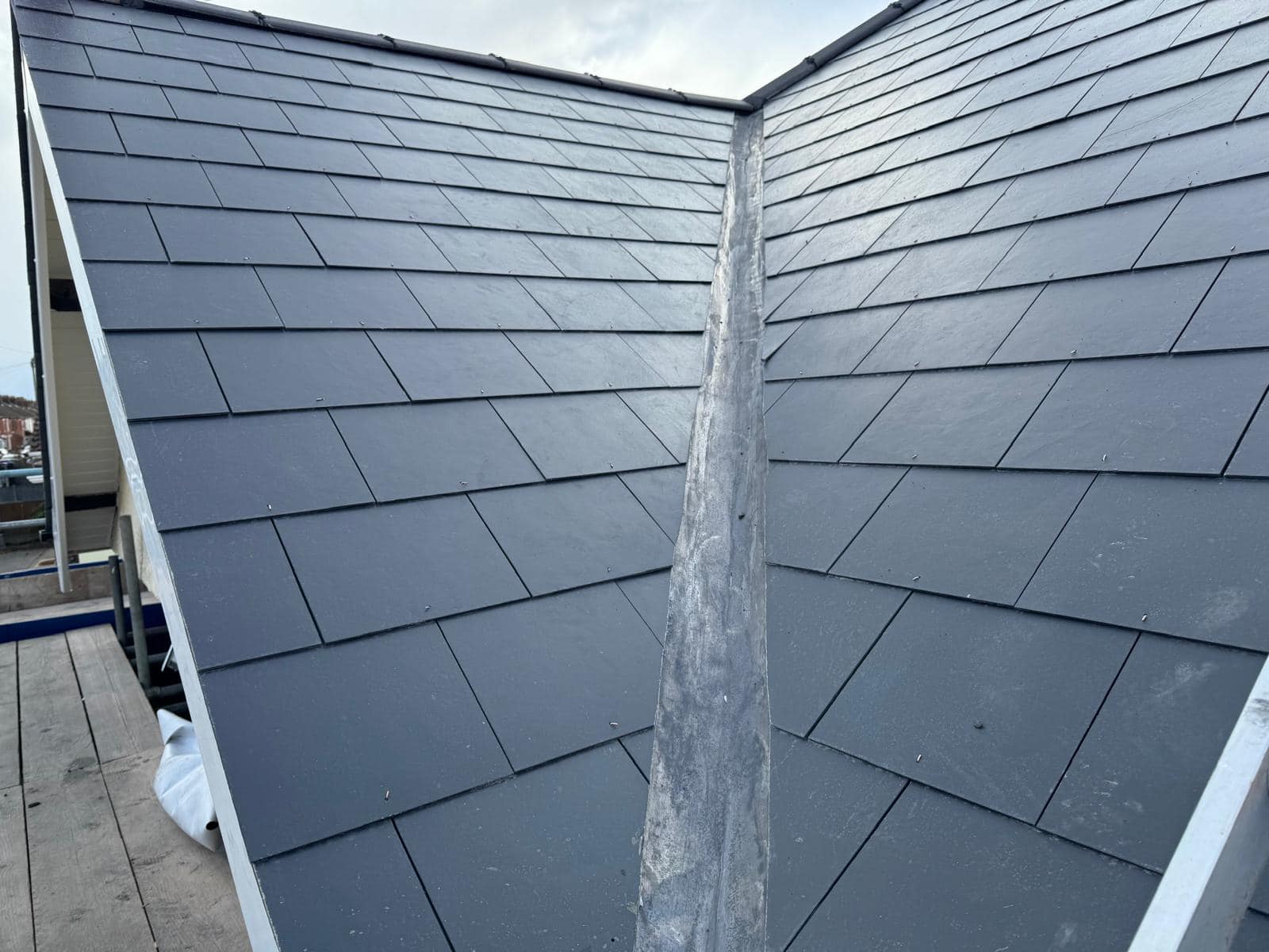 Professional roofers working on a property in London - KS Roof Master