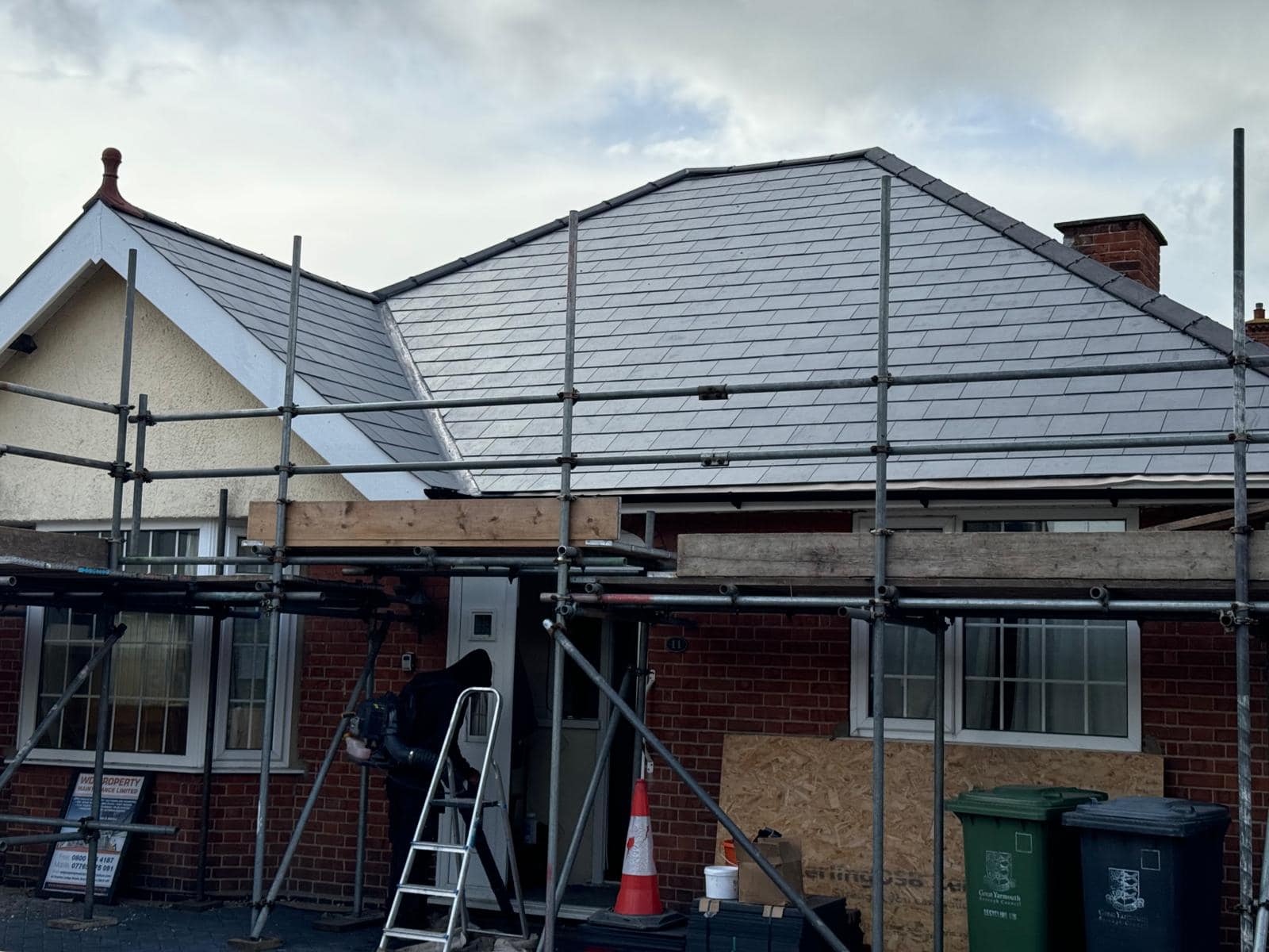 Professional roofers working on a property in London - KS Roof Master
