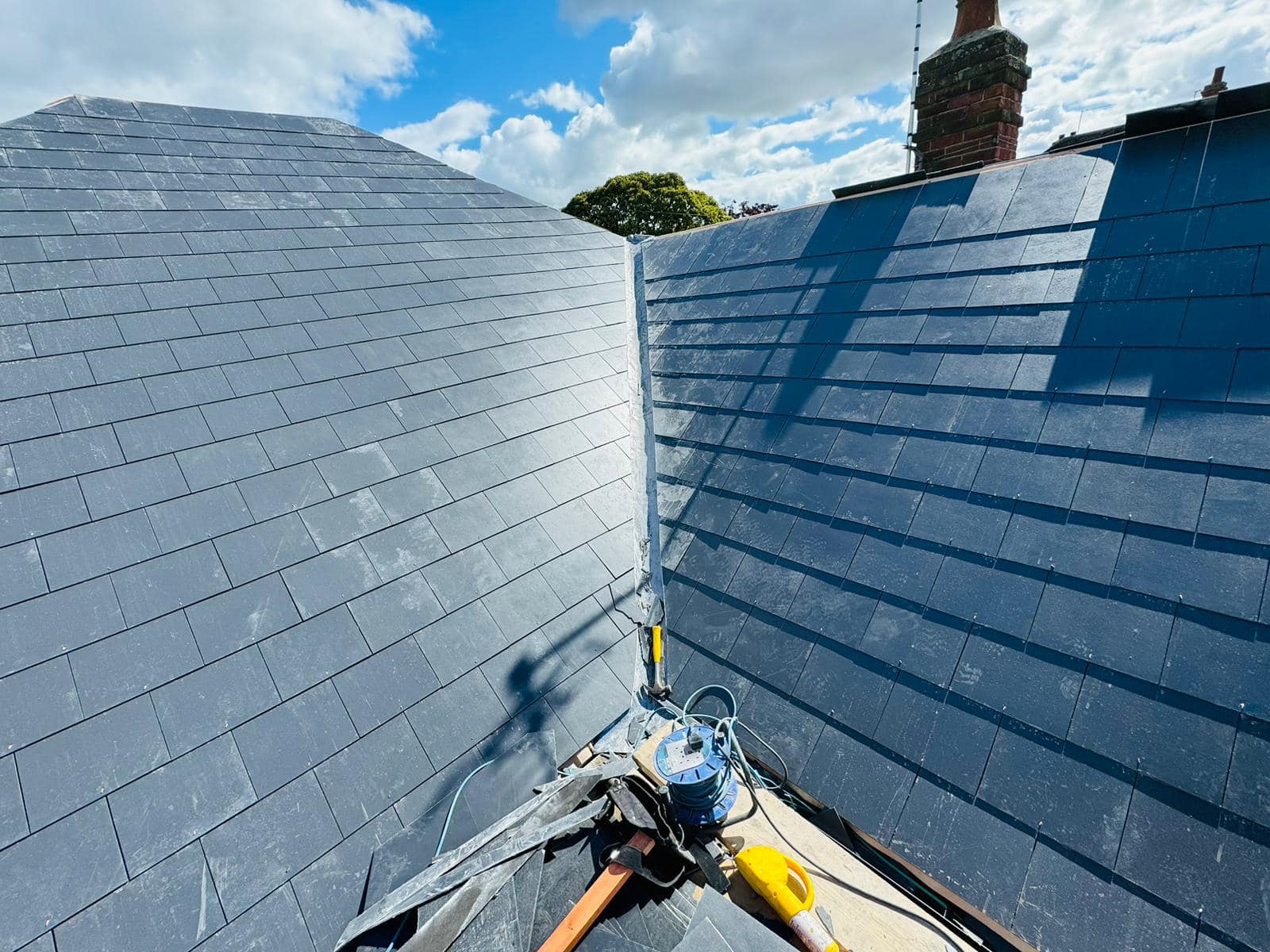 Professional roofers working on a property in London - KS Roof Master