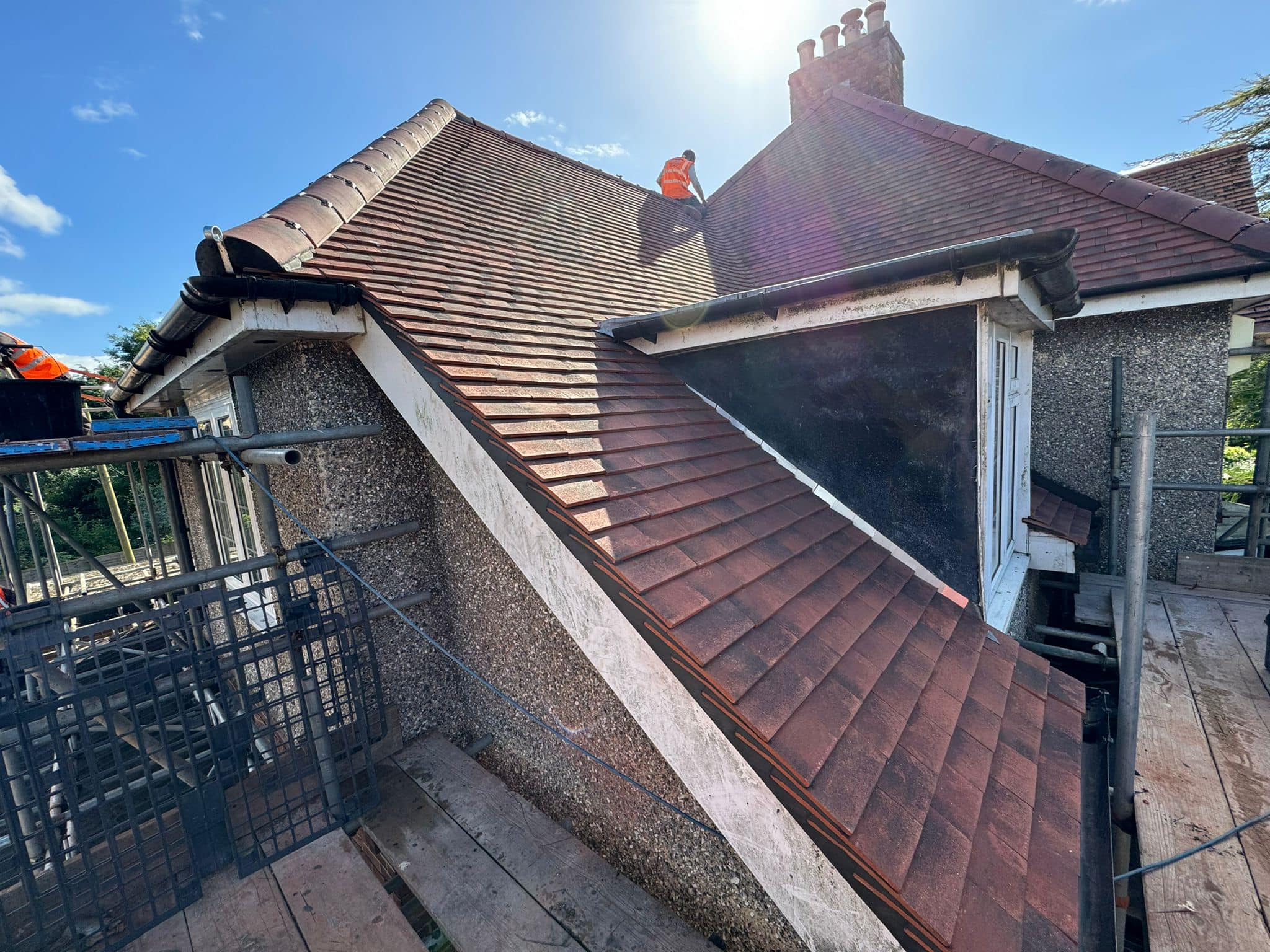 Professional roofers working on a property in London - KS Roof Master