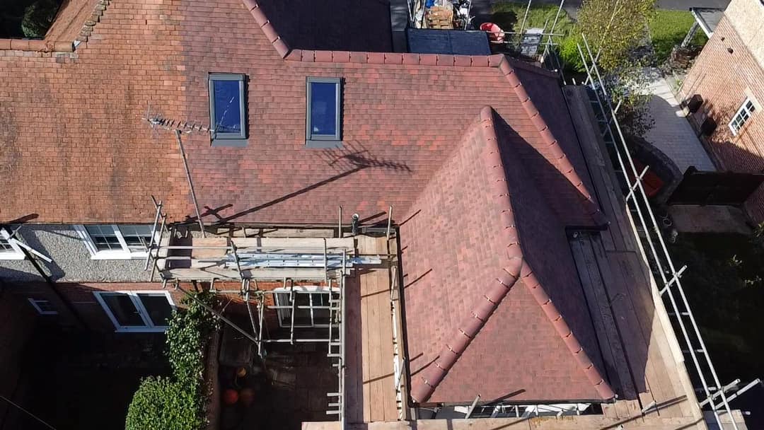 Professional roofers working on a property in London - KS Roof Master