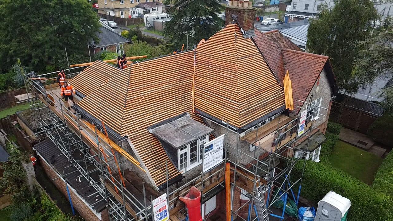 Professional roofers working on a property in London - KS Roof Master
