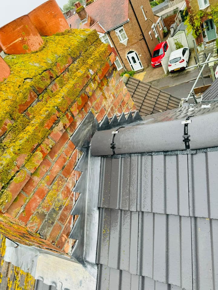 Professional roofers working on a property in London - KS Roof Master