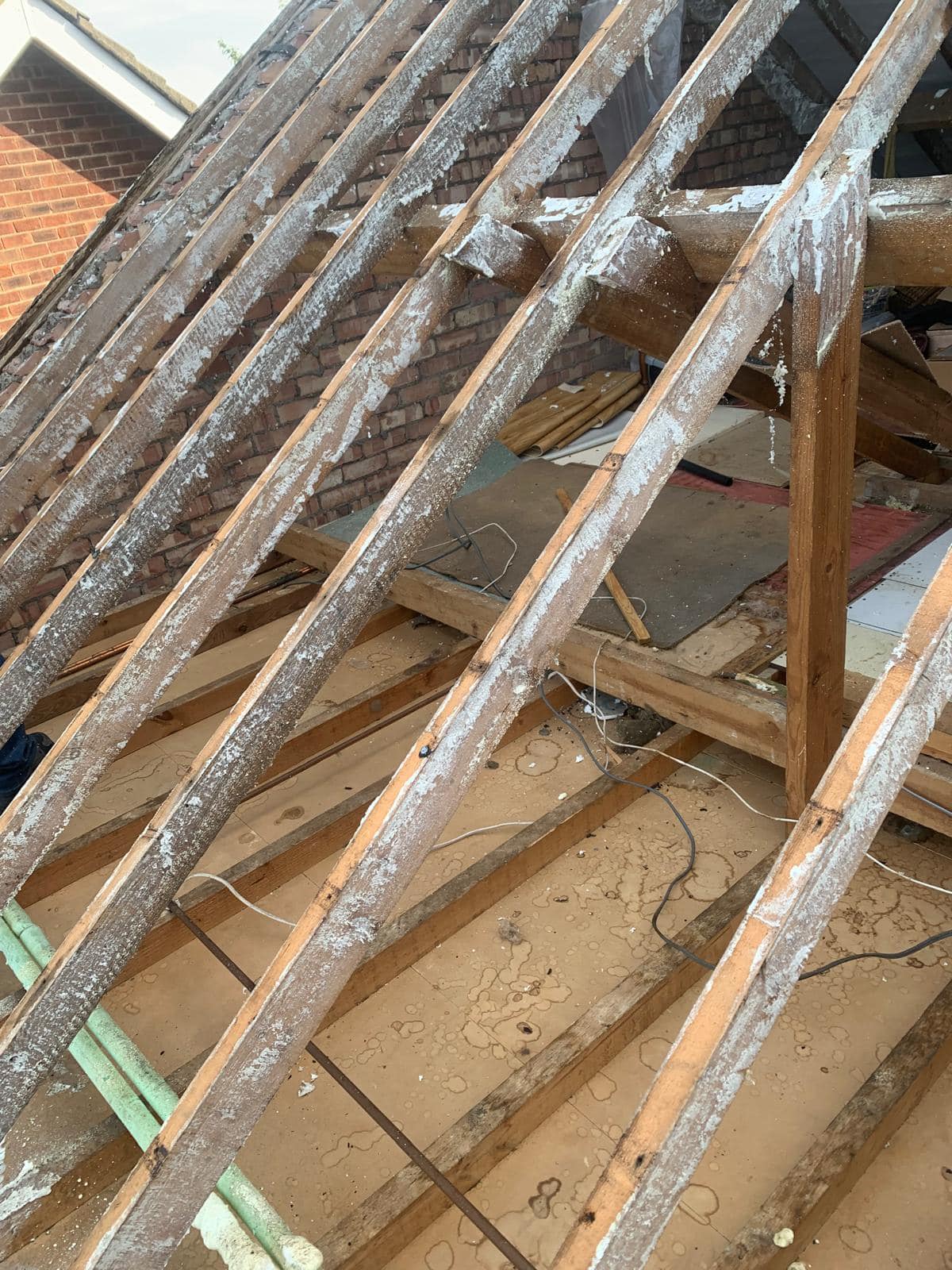 Professional roofers working on a property in London - KS Roof Master