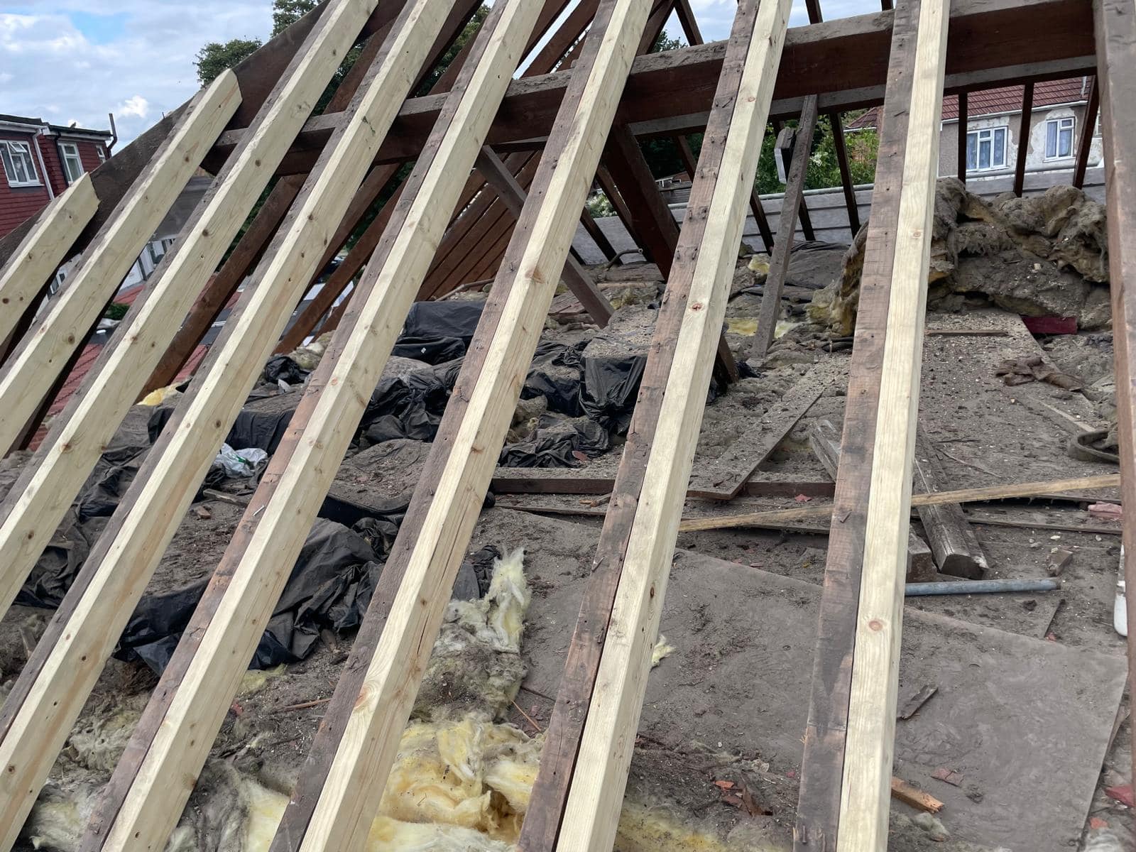 Professional roofers working on a property in London - KS Roof Master