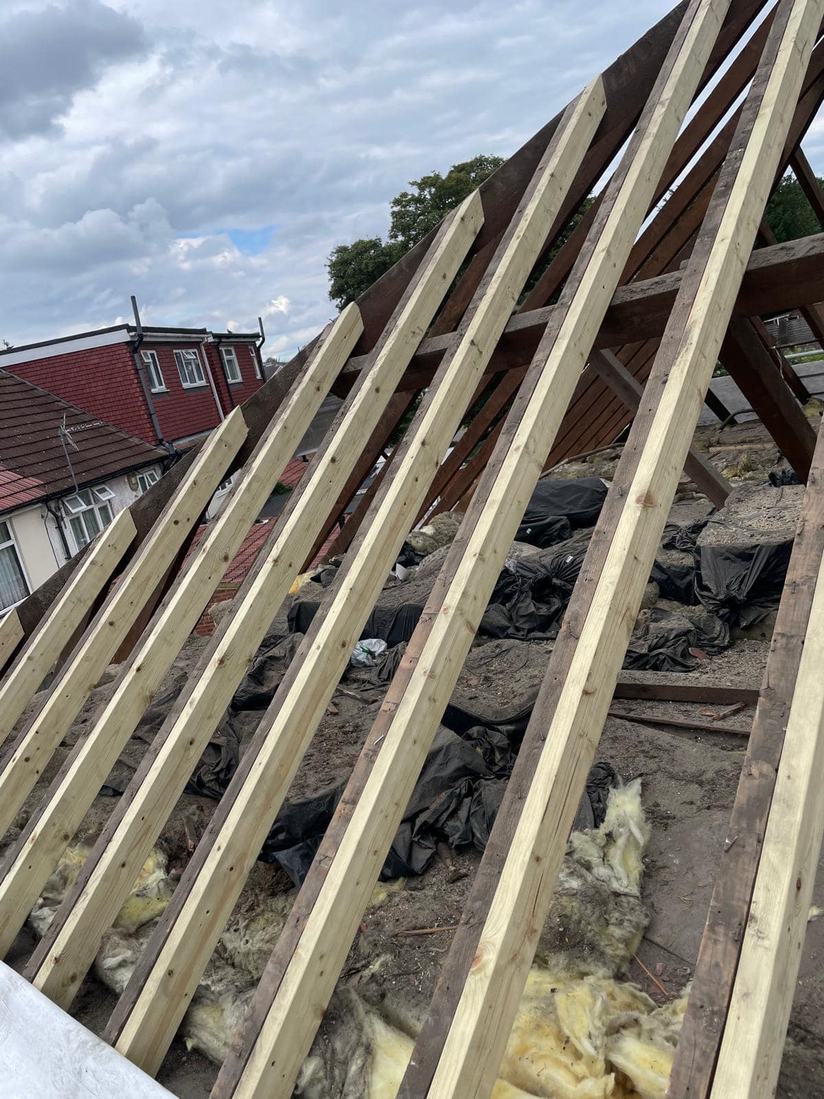 Professional roofers working on a property in London - KS Roof Master