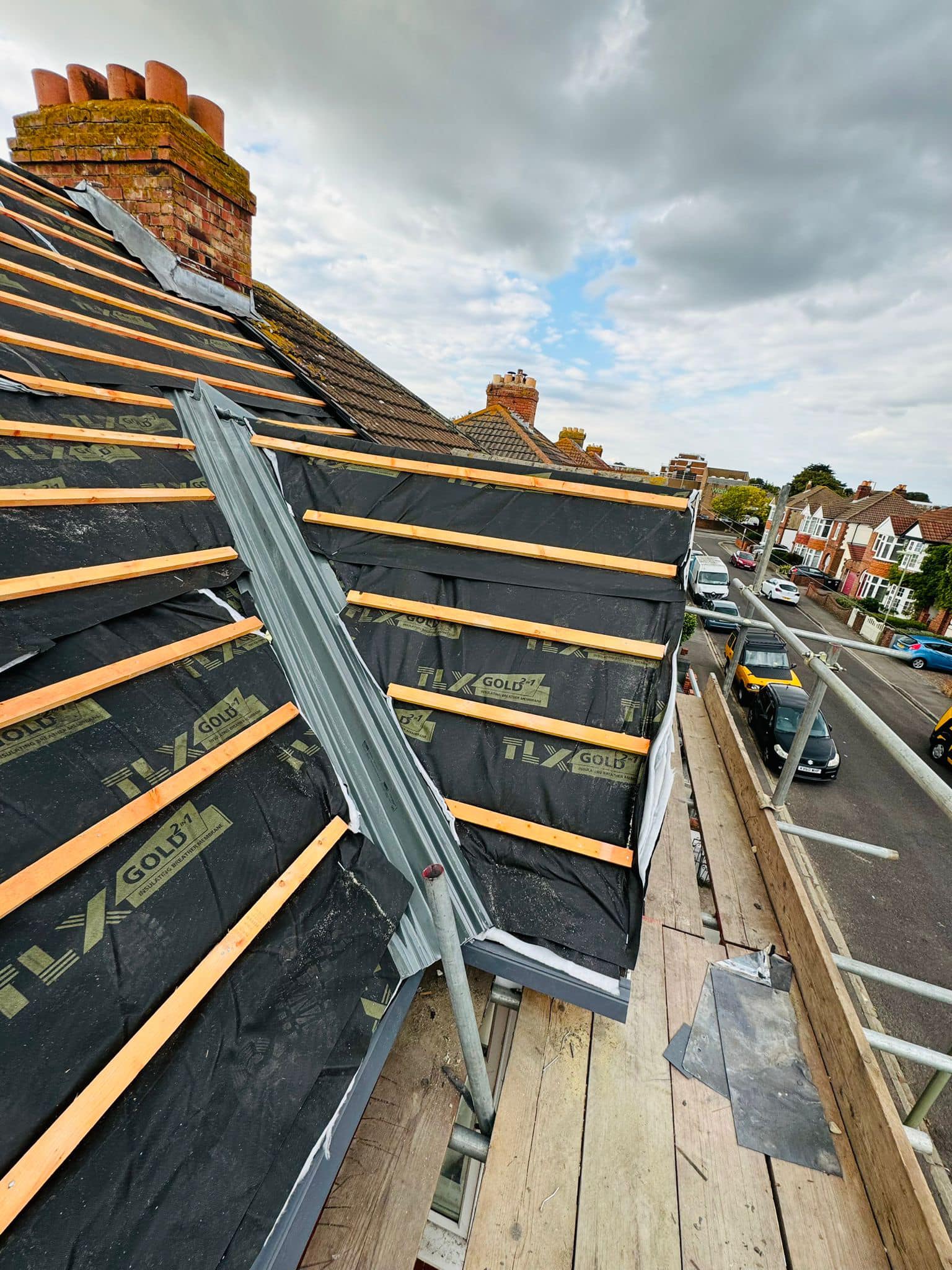 Professional roofers working on a property in London - KS Roof Master