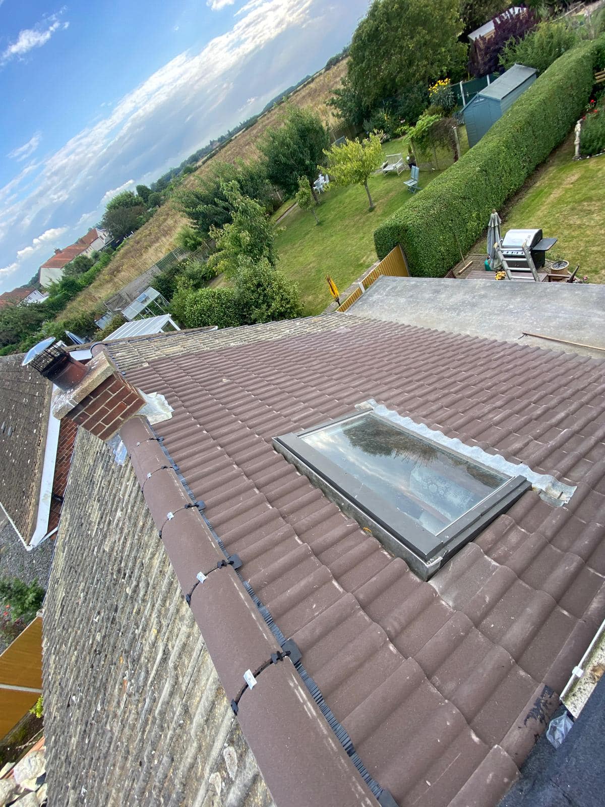 Professional roofers working on a property in London - KS Roof Master