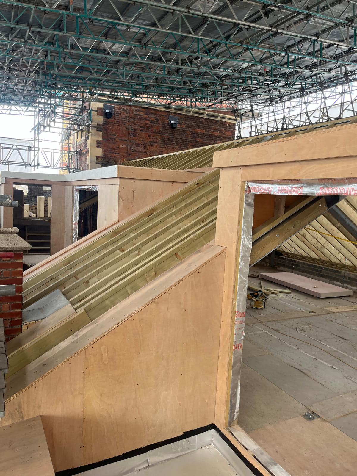 Professional roofers working on a property in London - KS Roof Master