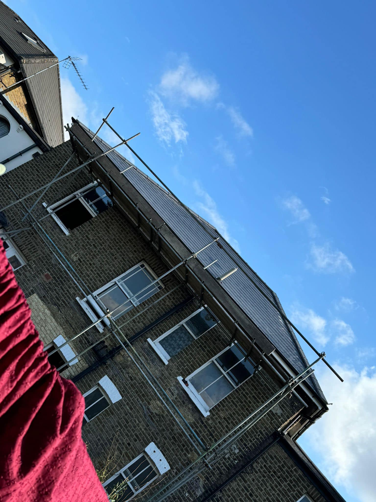 Professional roofers working on a property in London - KS Roof Master
