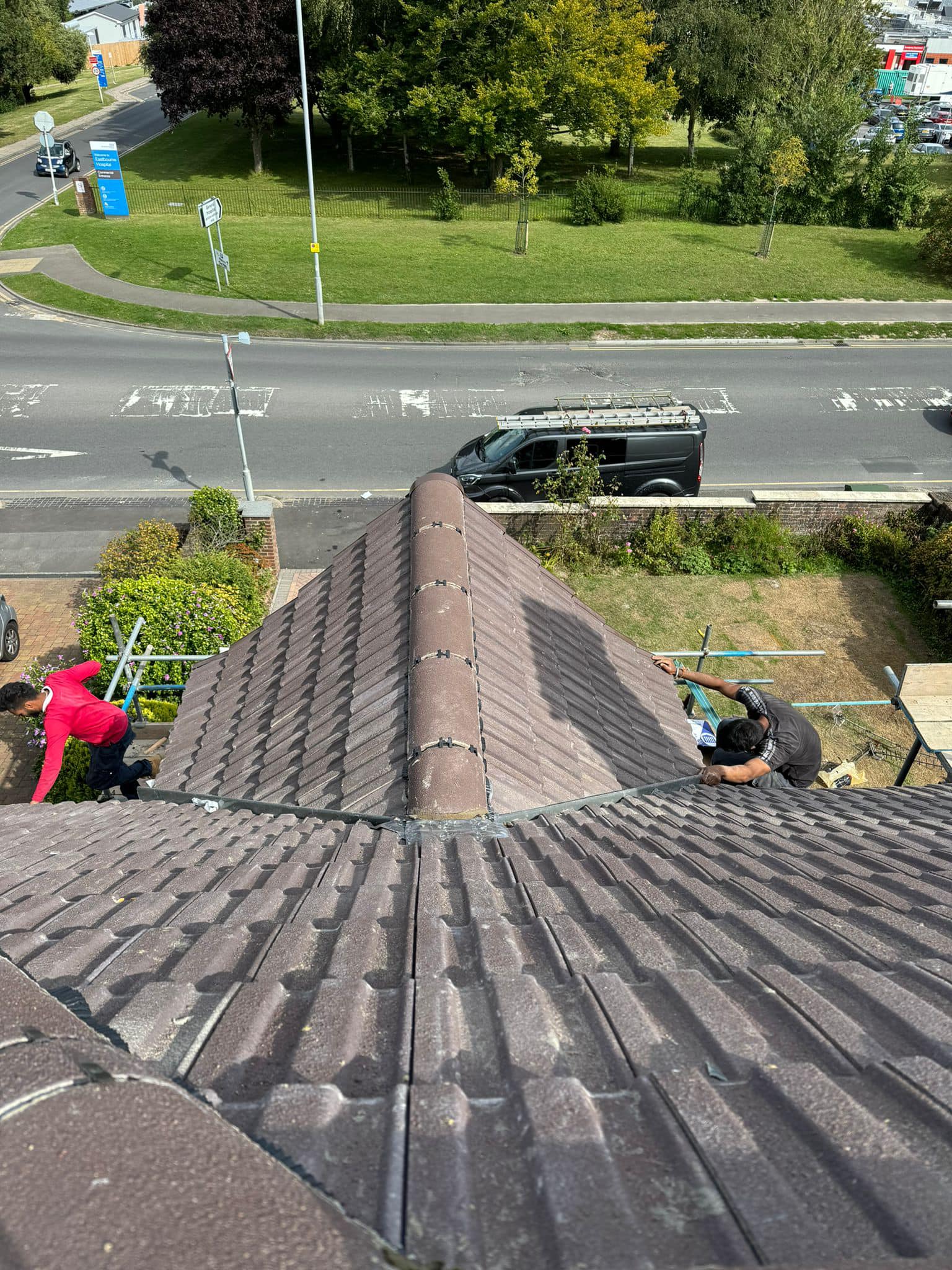 Professional roofers working on a property in London - KS Roof Master