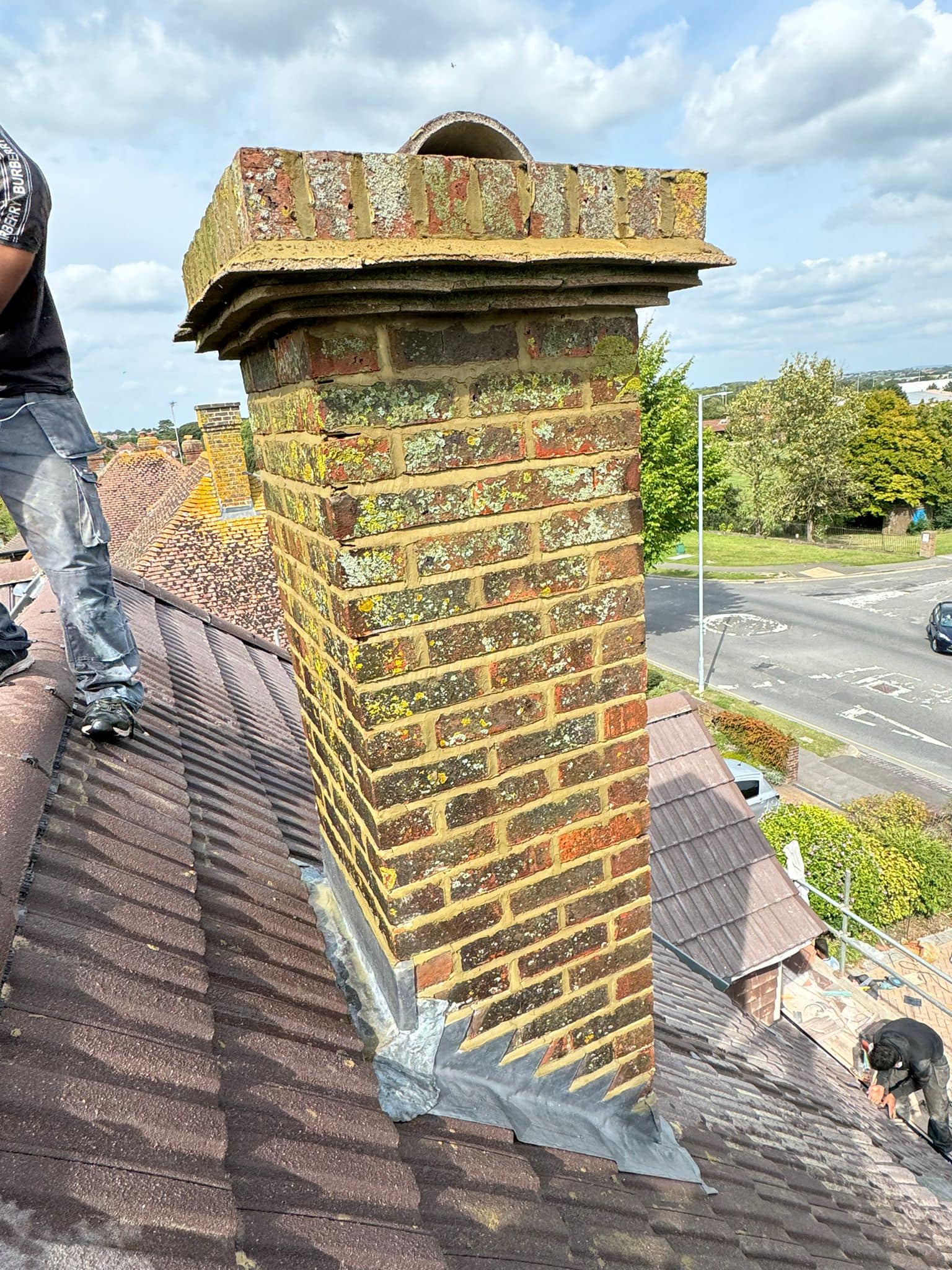 Professional roofers working on a property in London - KS Roof Master