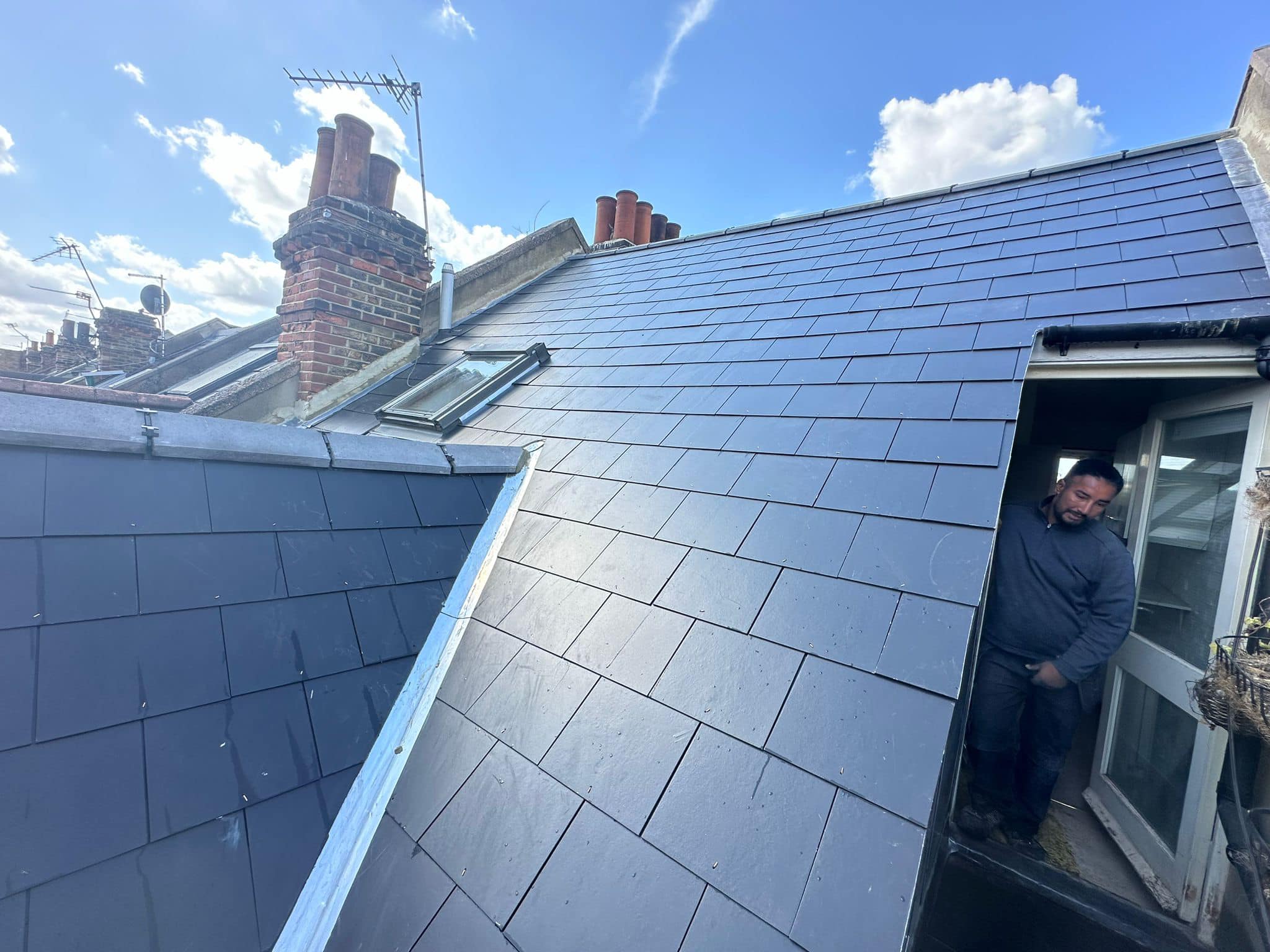 Professional roofers working on a property in London - KS Roof Master