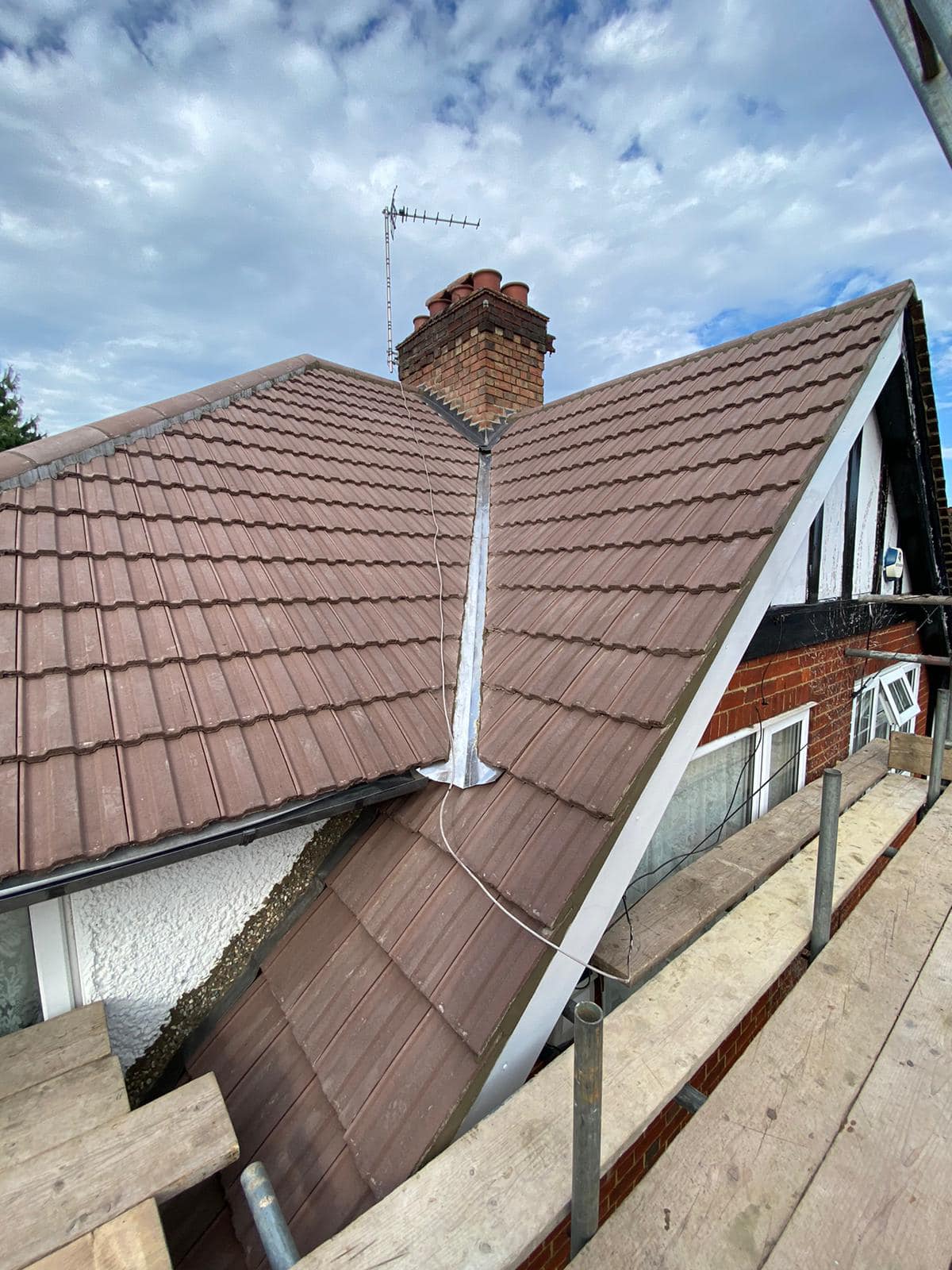 Professional roofers working on a property in London - KS Roof Master