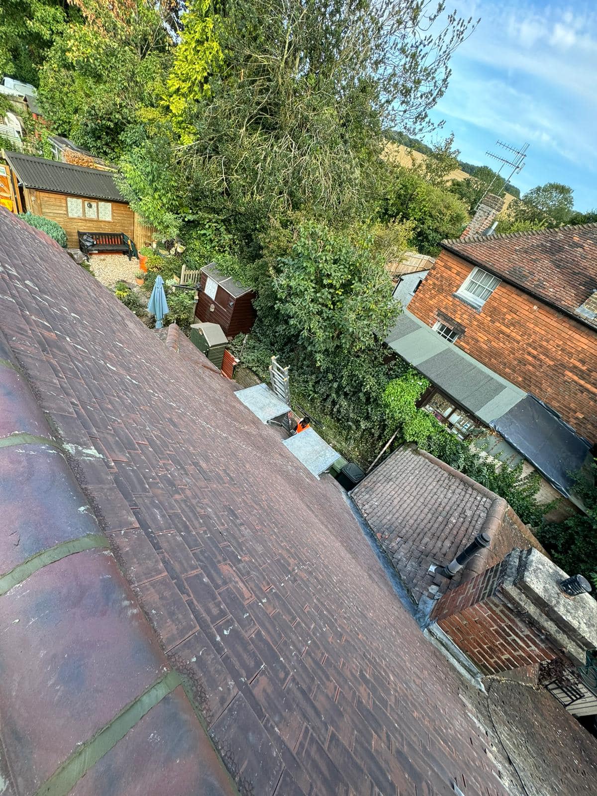 Professional roofers working on a property in London - KS Roof Master