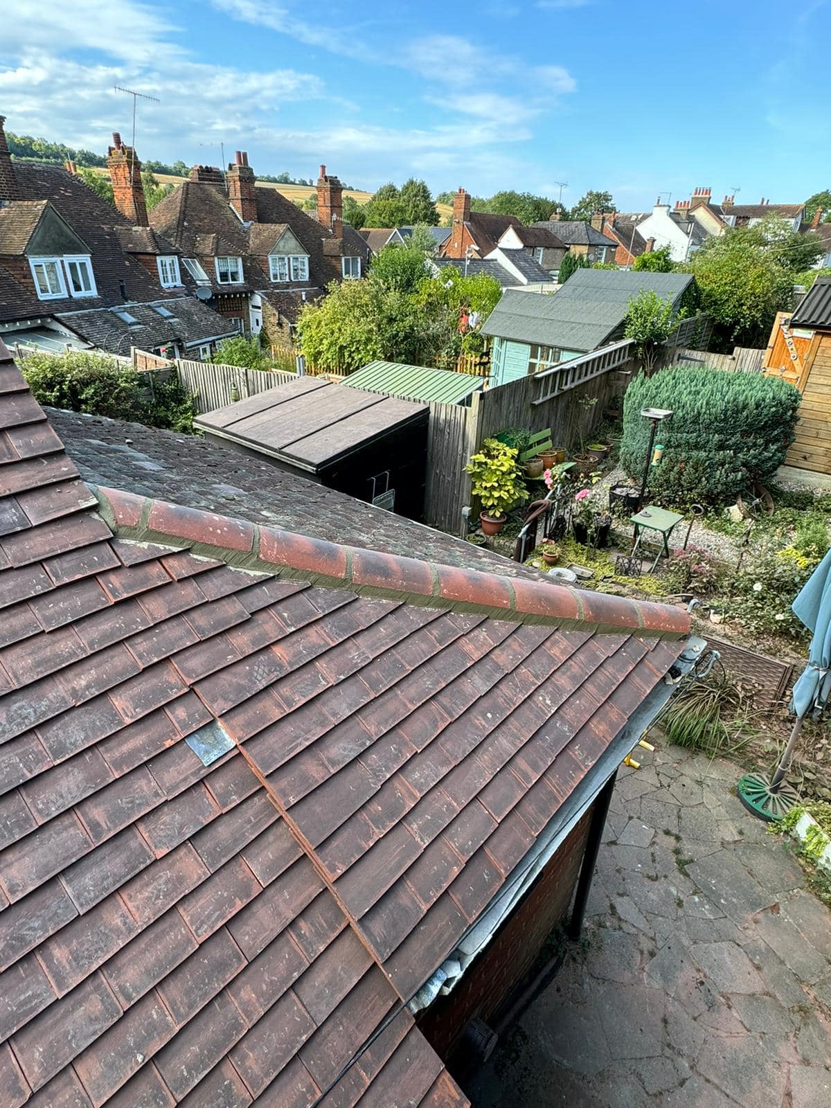 Professional roofers working on a property in London - KS Roof Master