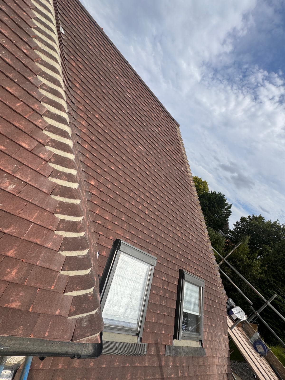 Professional roofers working on a property in London - KS Roof Master