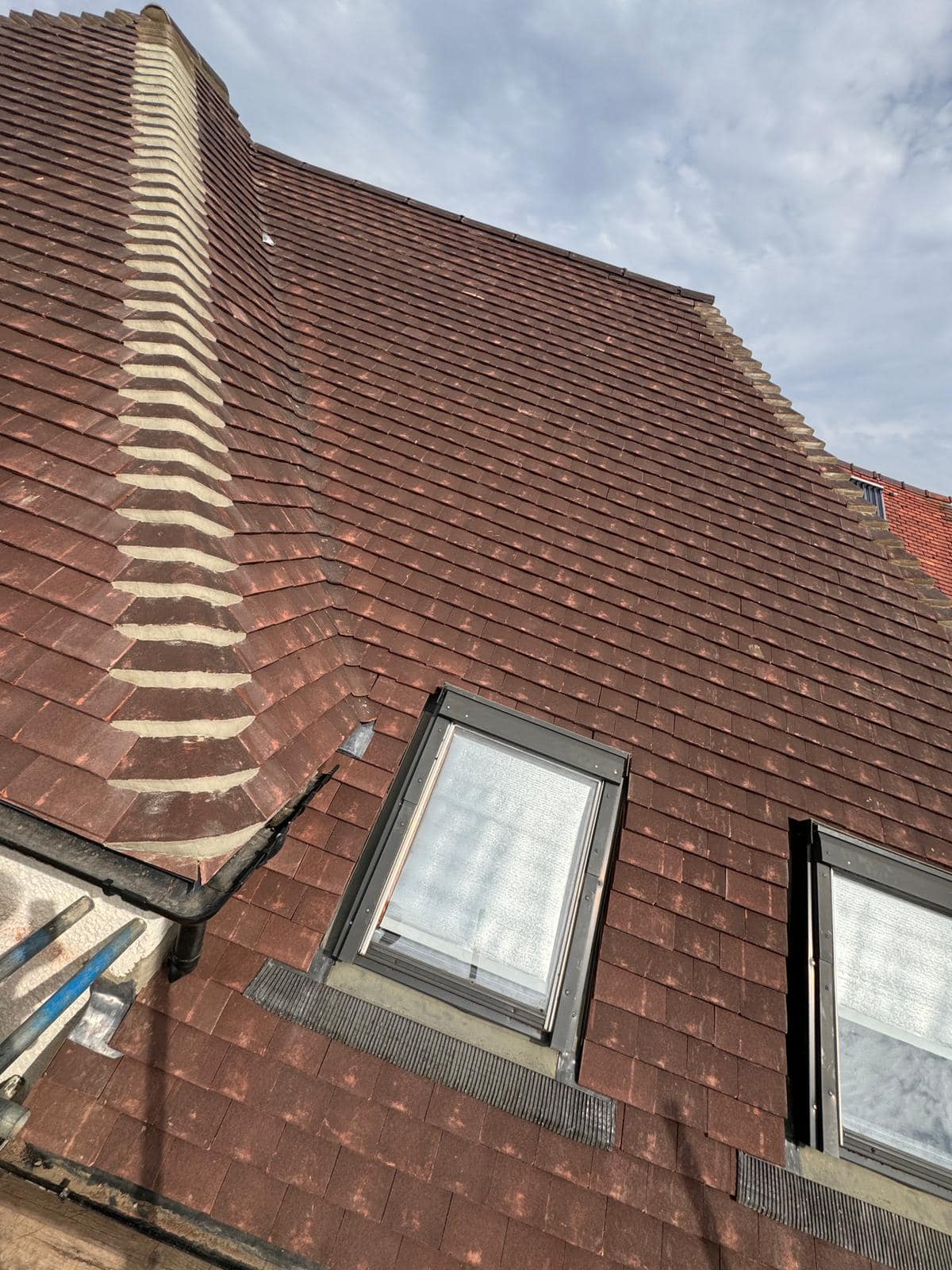 Professional roofers working on a property in London - KS Roof Master