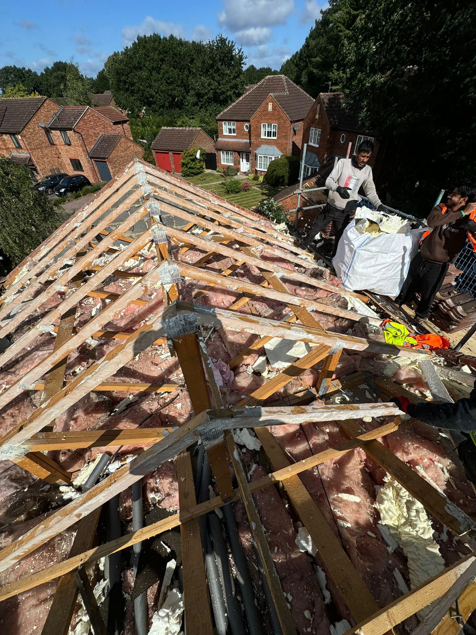Professional roofers working on a property in London - KS Roof Master