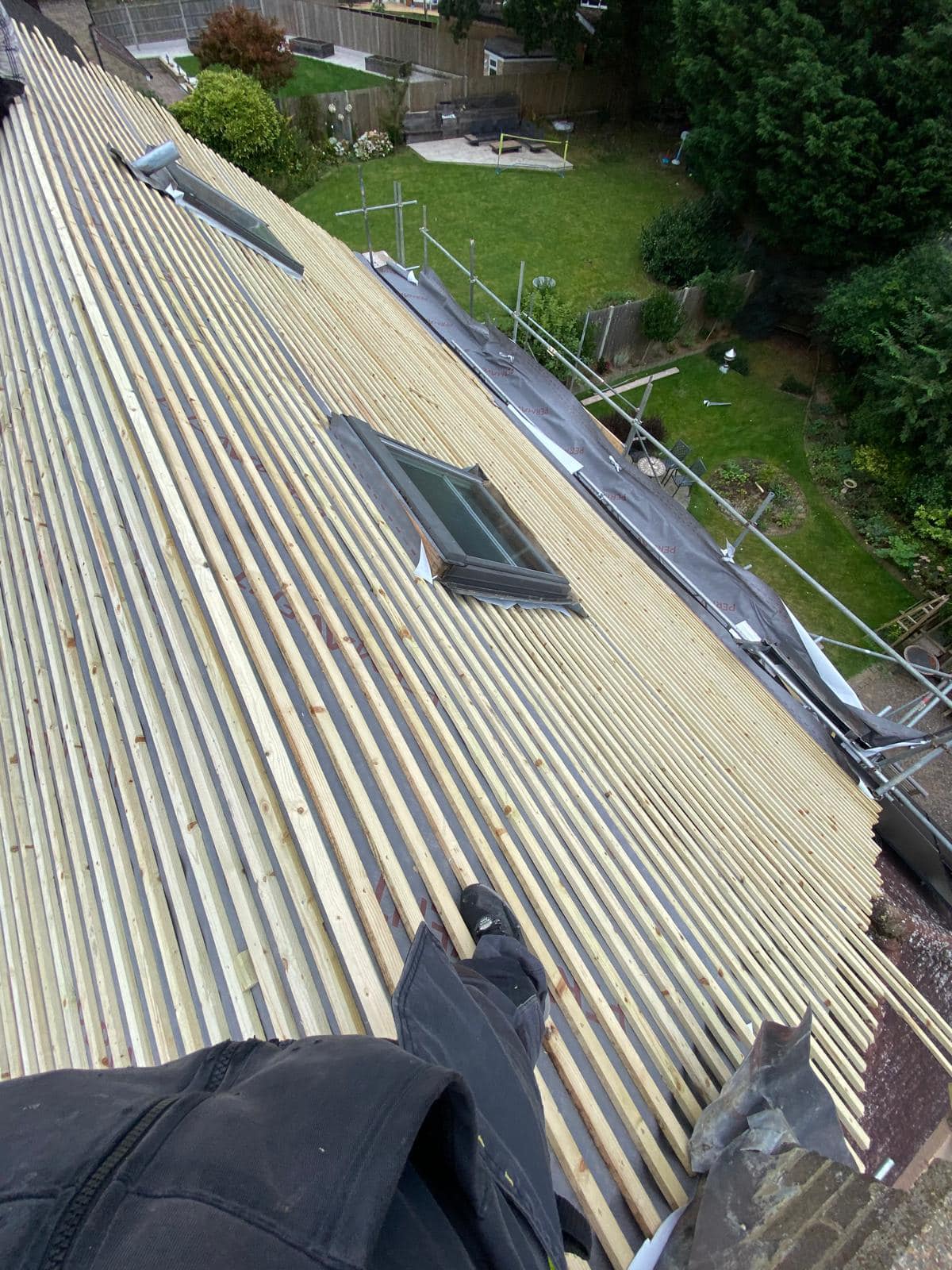Professional roofers working on a property in London - KS Roof Master