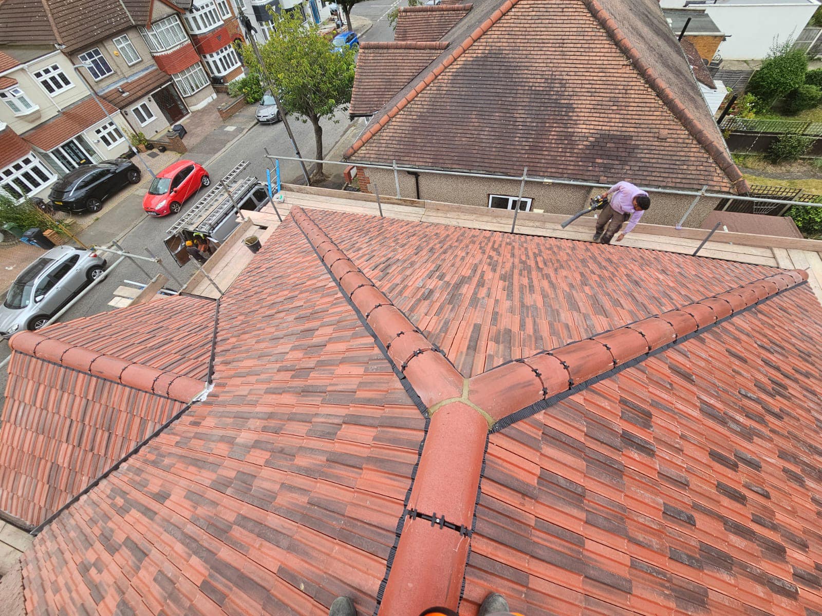 Professional roofers working on a property in London - KS Roof Master