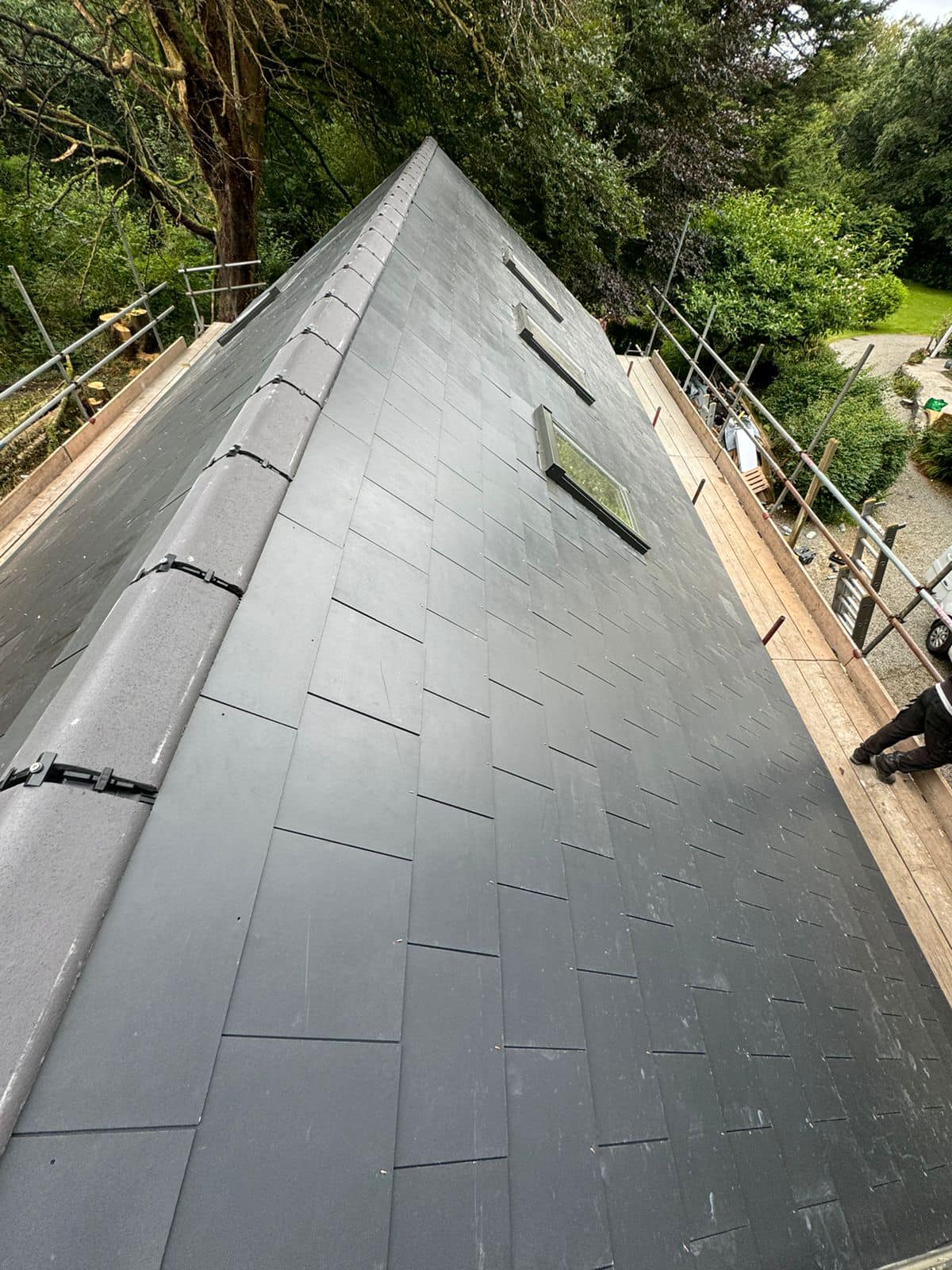 Professional roofers working on a property in London - KS Roof Master