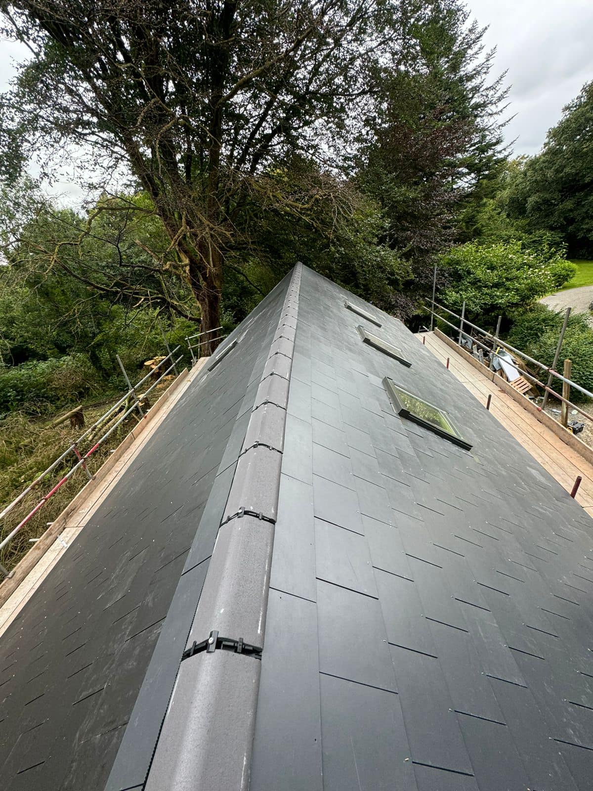 Professional roofers working on a property in London - KS Roof Master