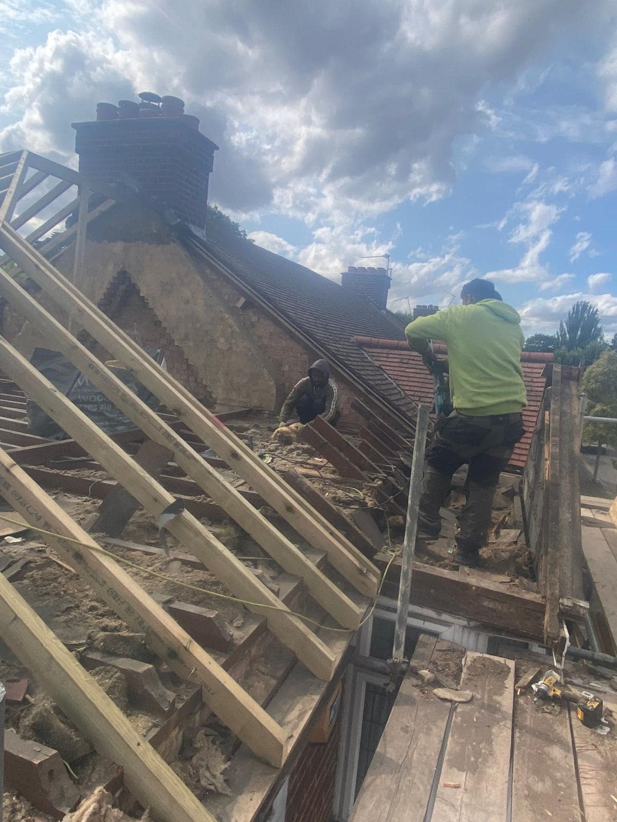 Professional roofers working on a property in London - KS Roof Master