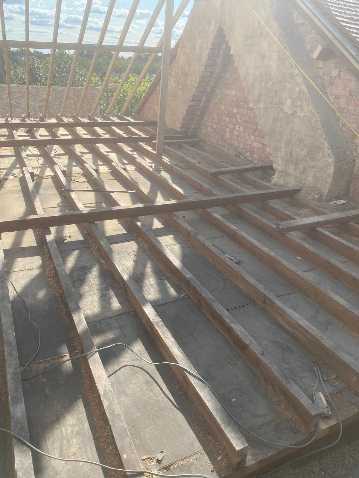 Professional roofers working on a property in London - KS Roof Master