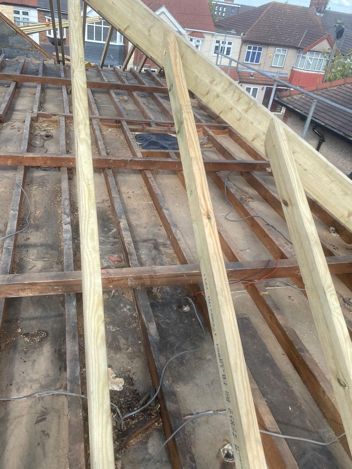 Professional roofers working on a property in London - KS Roof Master