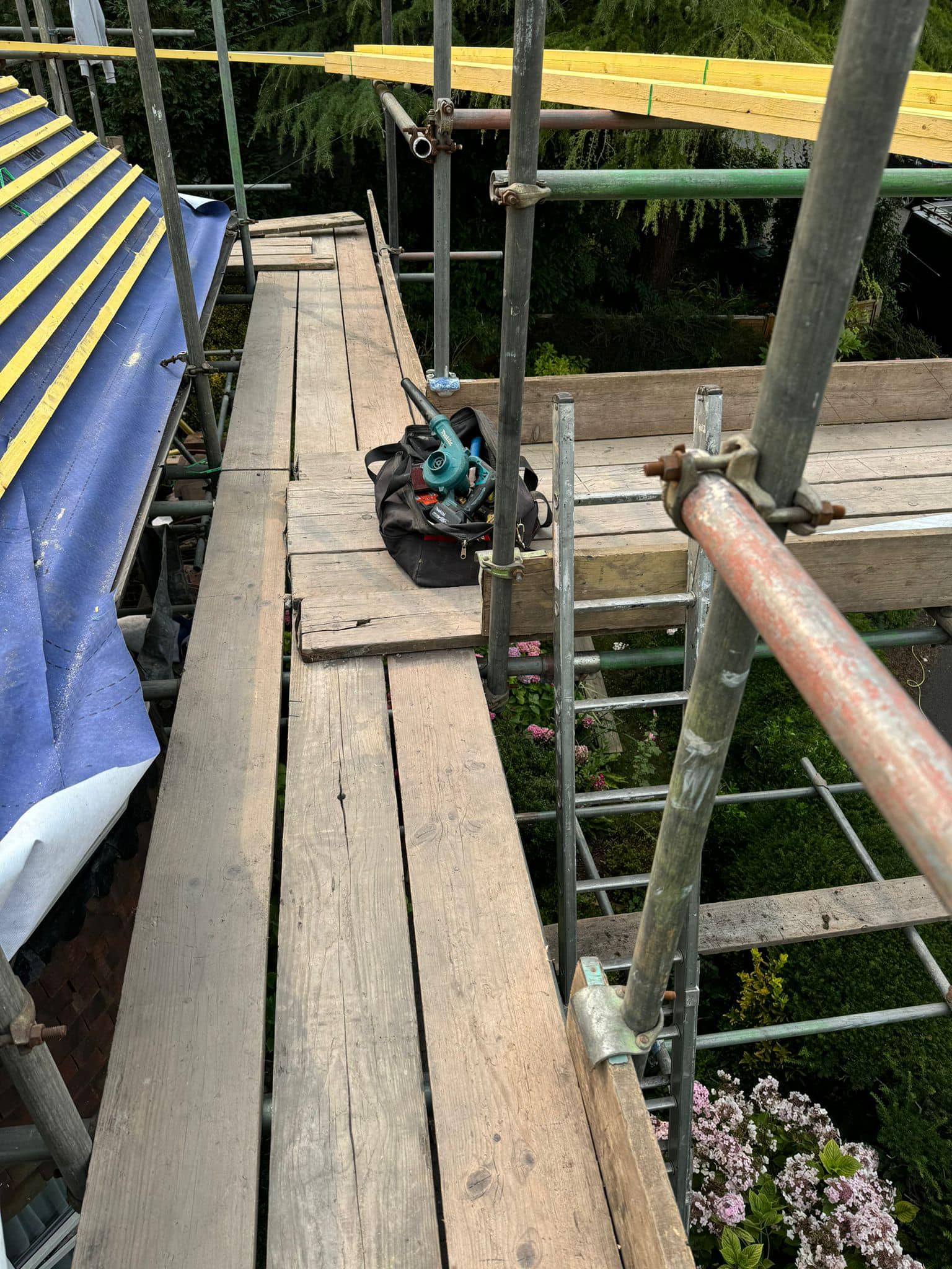 Professional roofers working on a property in London - KS Roof Master