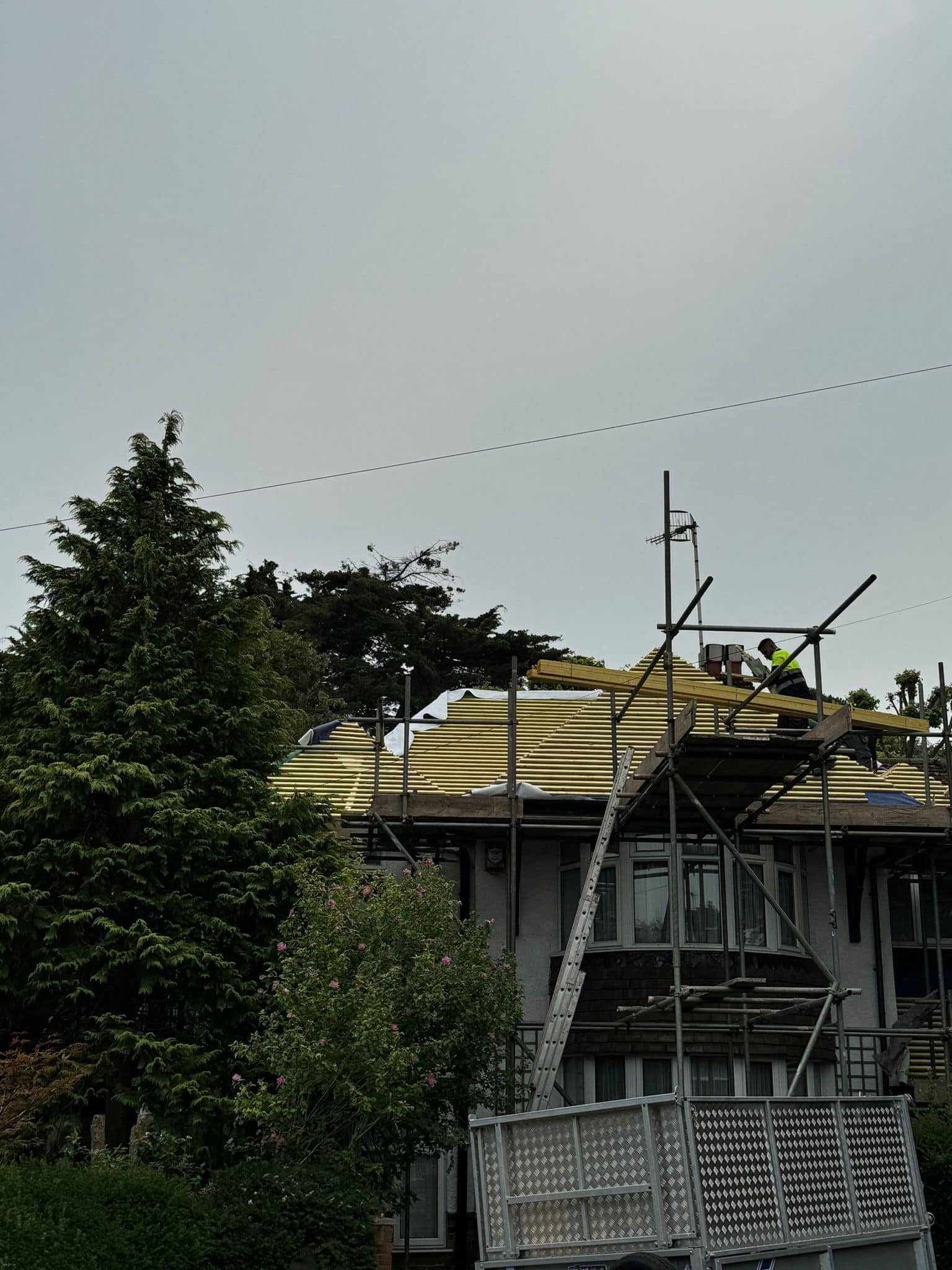 Professional roofers working on a property in London - KS Roof Master