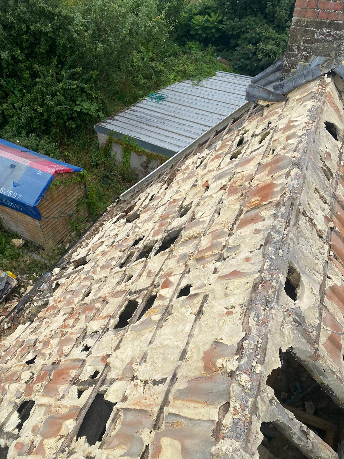 Professional roofers working on a property in London - KS Roof Master