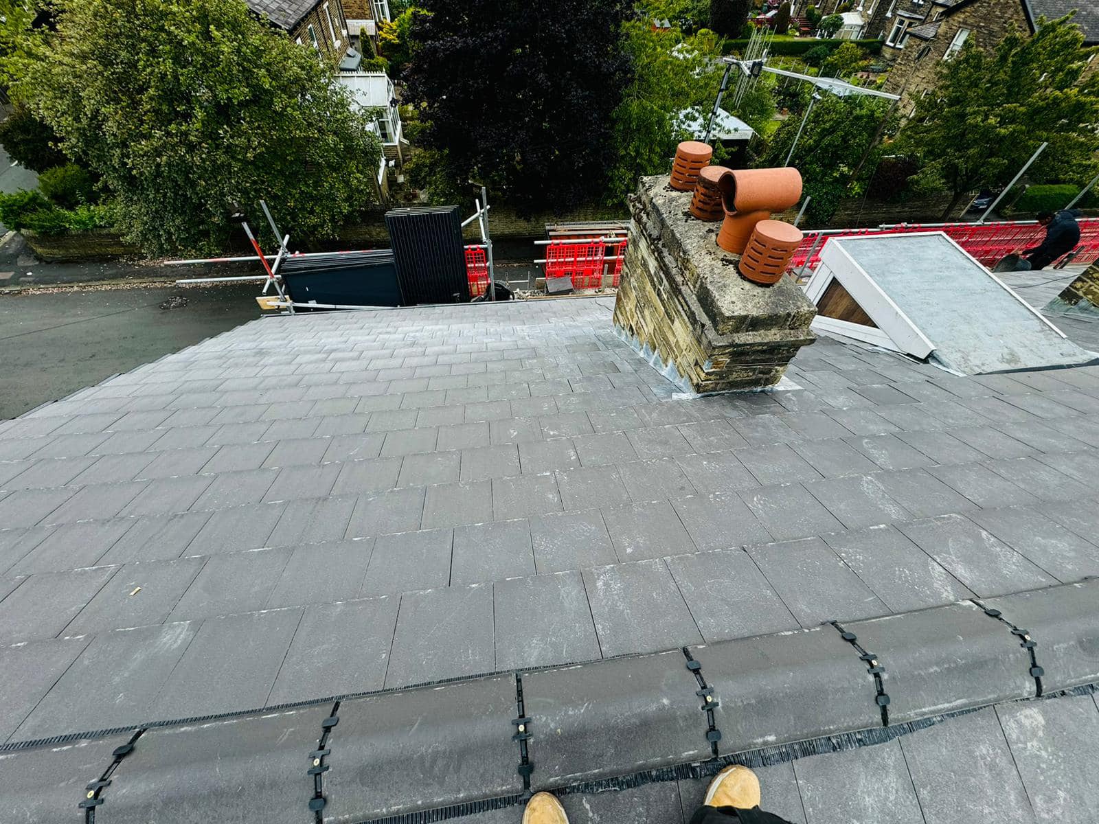 Professional roofers working on a property in London - KS Roof Master