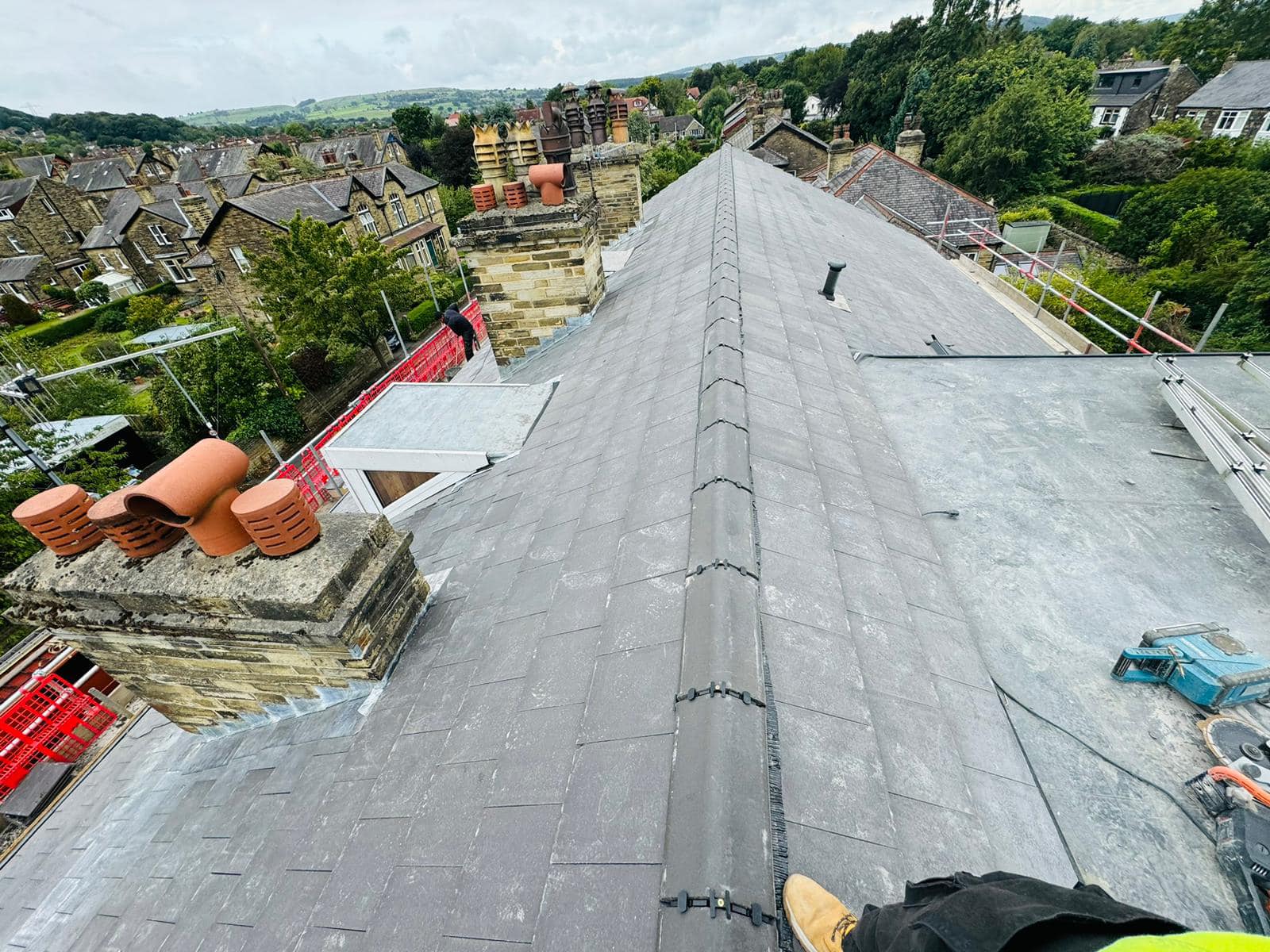 Professional roofers working on a property in London - KS Roof Master