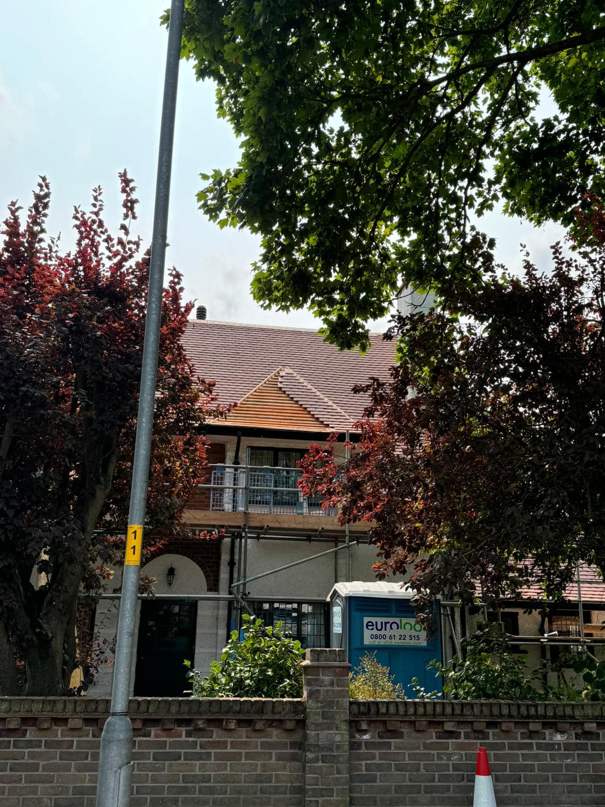 Professional roofers working on a property in London - KS Roof Master