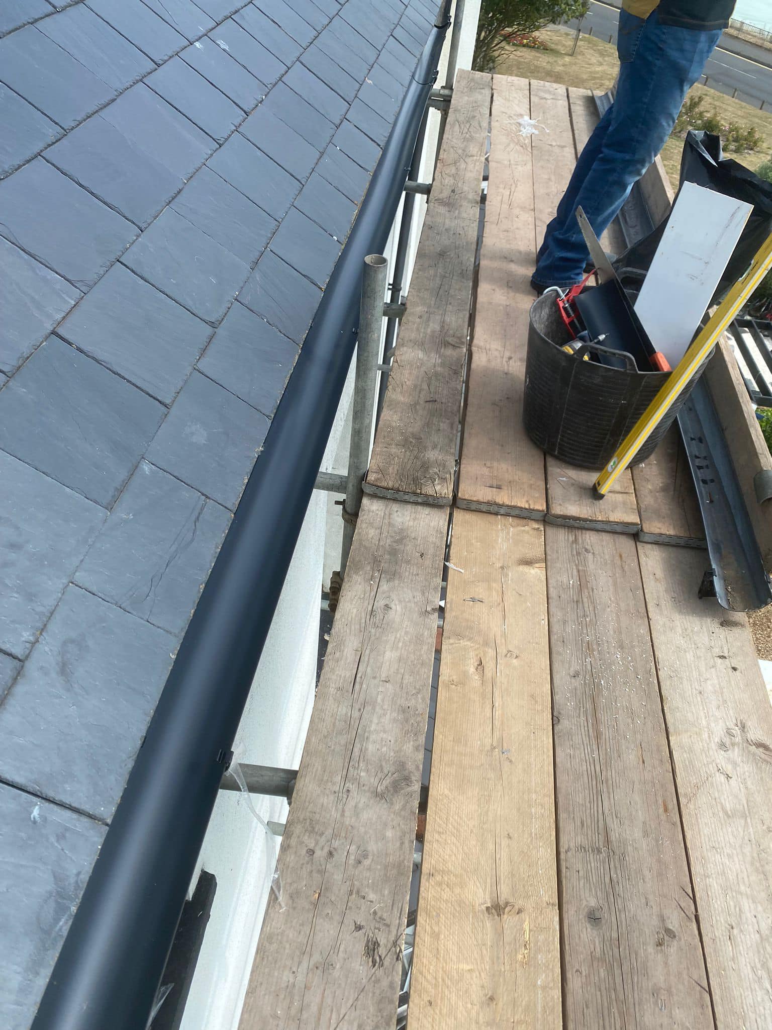 Professional roofers working on a property in London - KS Roof Master